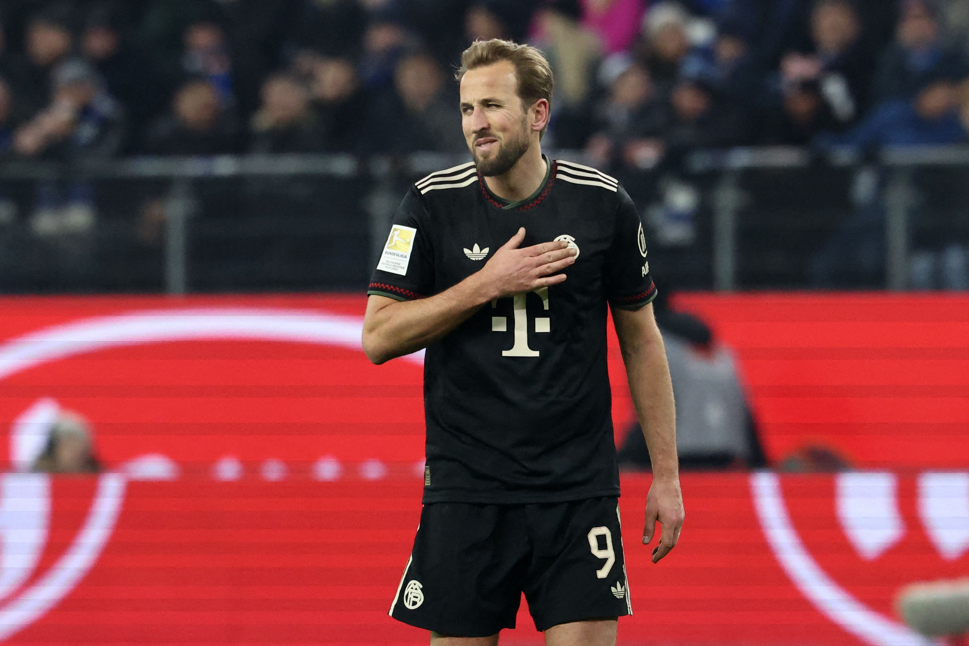 Bayern Munich's English forward #09 Harry Kane reacts after a missed attempt on goal during the German first division Bundesliga football match between Hamburger SV and FC Bayern Munich in Hamburg, northern Germany on January 31, 2026. (Photo by IBRAHIM OT / AFP) / DFL REGULATIONS PROHIBIT ANY USE OF PHOTOGRAPHS AS IMAGE SEQUENCES AND/OR QUASI-VIDEO