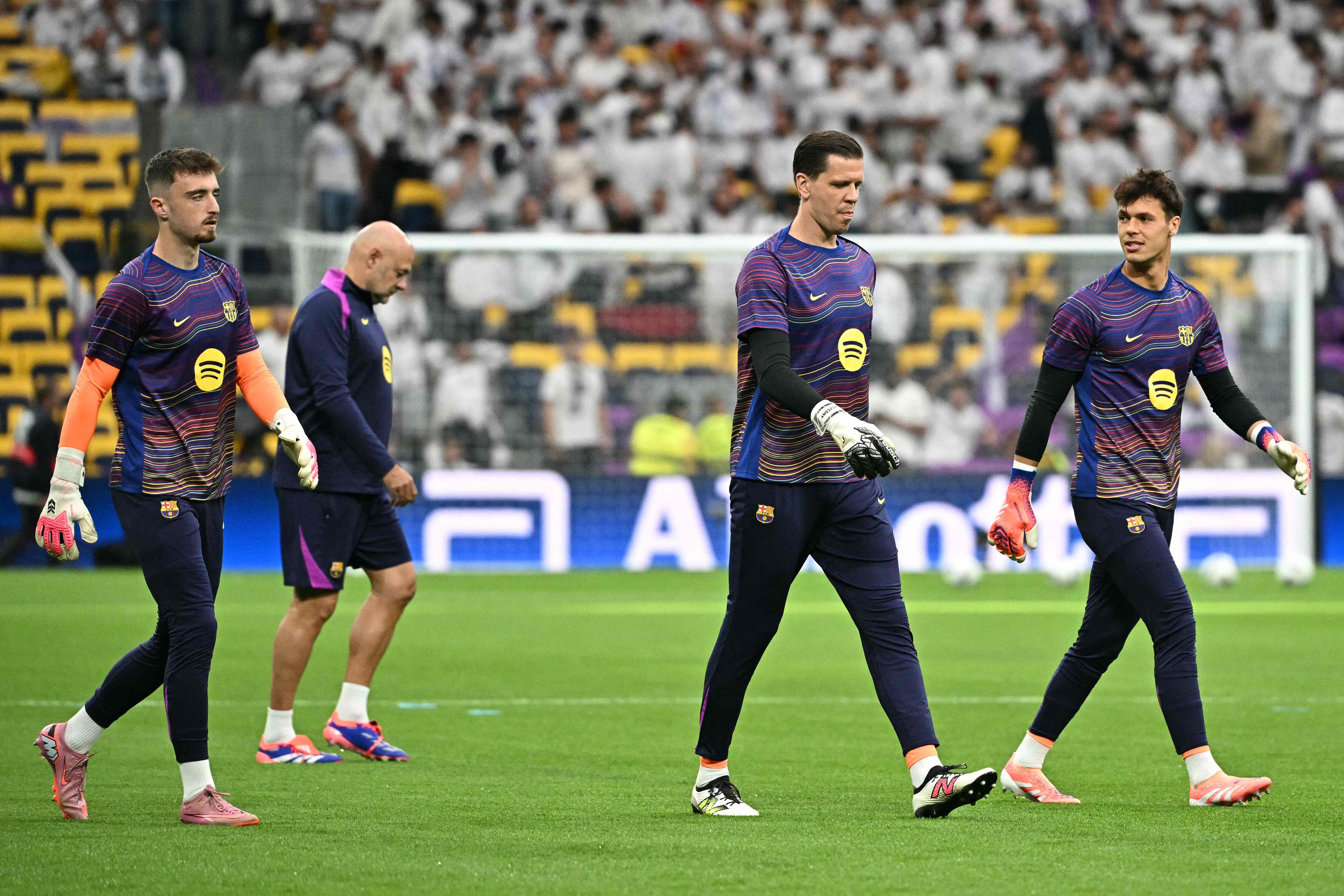 Real Madrid and Barcelona players prepare for kick-off