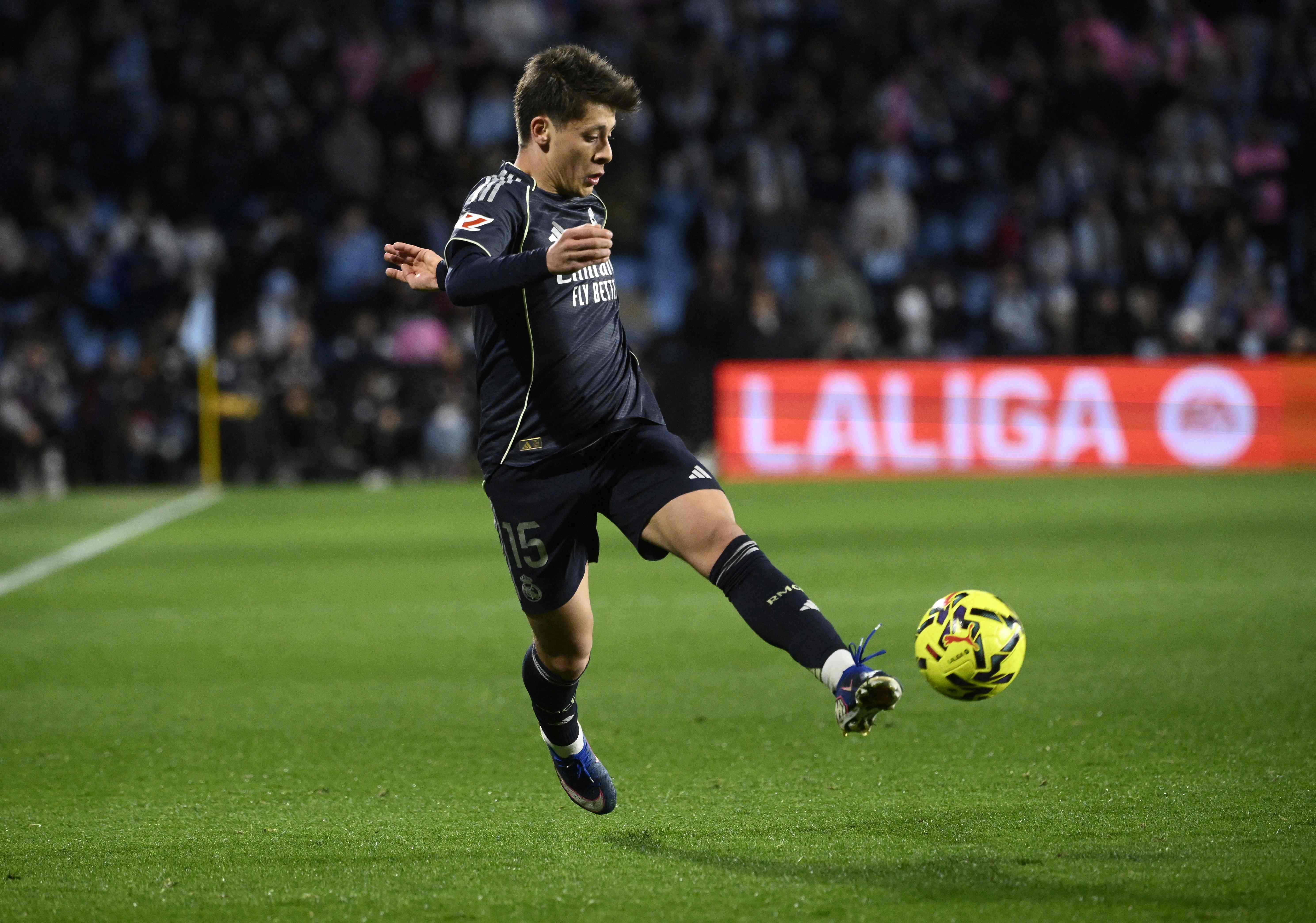 Real Madrid's Turkish midfielder #15 Arda Guler controls the ball during the Spanish league football match between Celta Vigo and Real Madrid CF at the Balaidos Stadium in Vigo on March 6, 2026. (Photo by Miguel RIOPA / AFP)