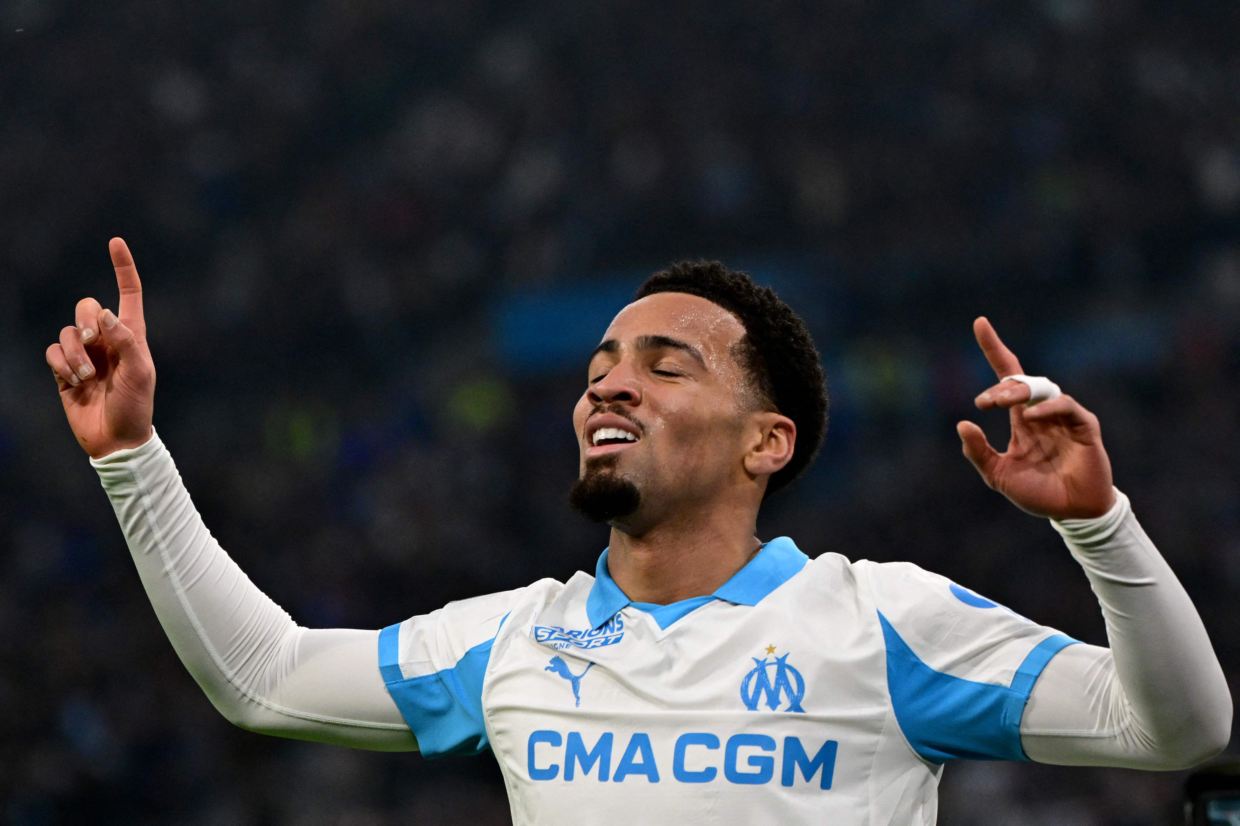 Marseille's English midfielder #11 Ethan Nwaneri celebrates after scoring a goal during the French L1 football match between Olympique de Marseille (OM) and RC Lens at the Stade Velodrome in Marseille, southern France, on January 24, 2026. (Photo by Miguel MEDINA / AFP)