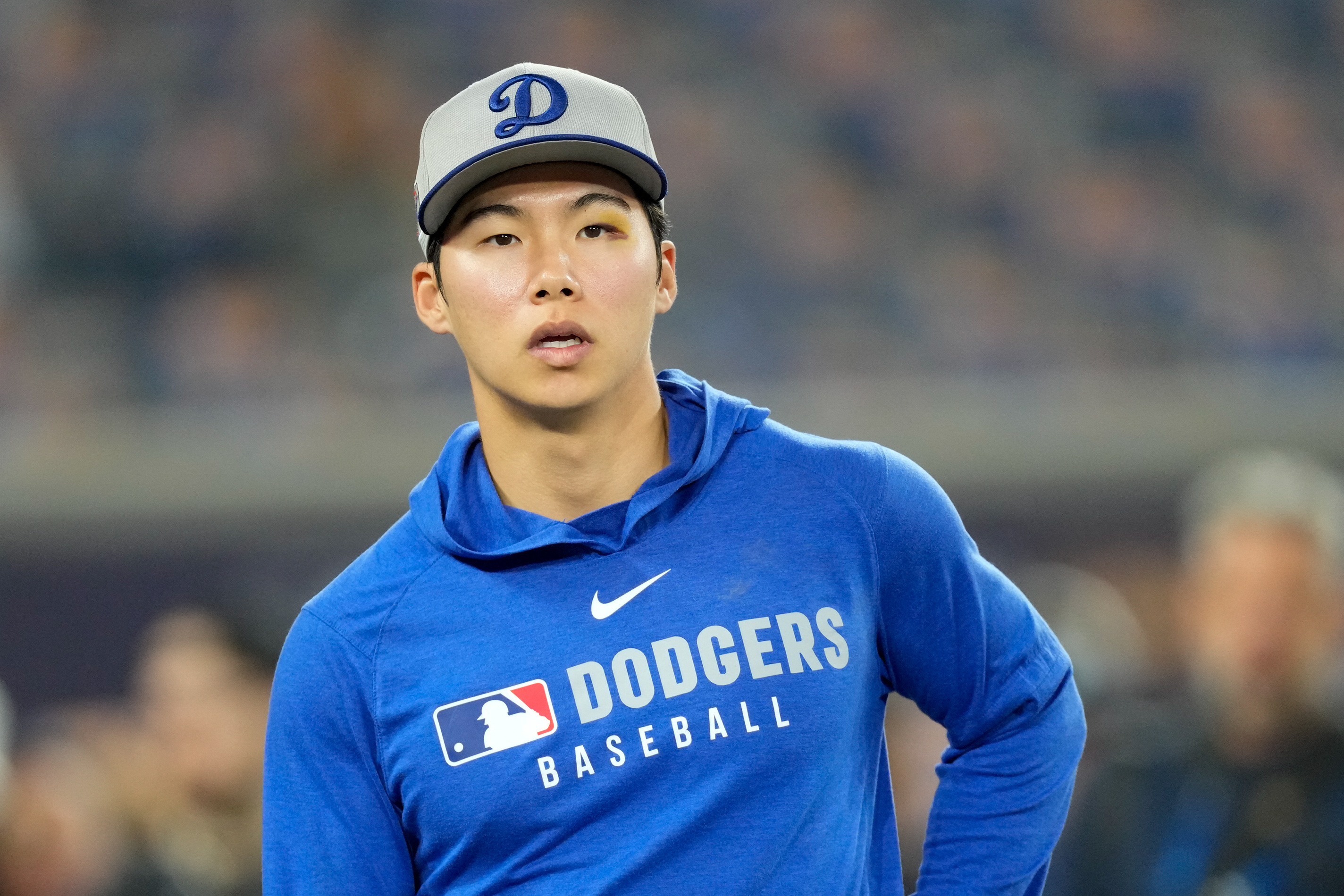 Oct 24, 2025; Toronto, Ontario, CAN; Los Angeles Dodgers pitcher Yoshinobu Yamamoto (18) looks on during batting practice prior to game one of the 2025 MLB World Series against the Toronto Blue Jays at Rogers Centre. Mandatory Credit: Kevin Sousa-Imagn Images