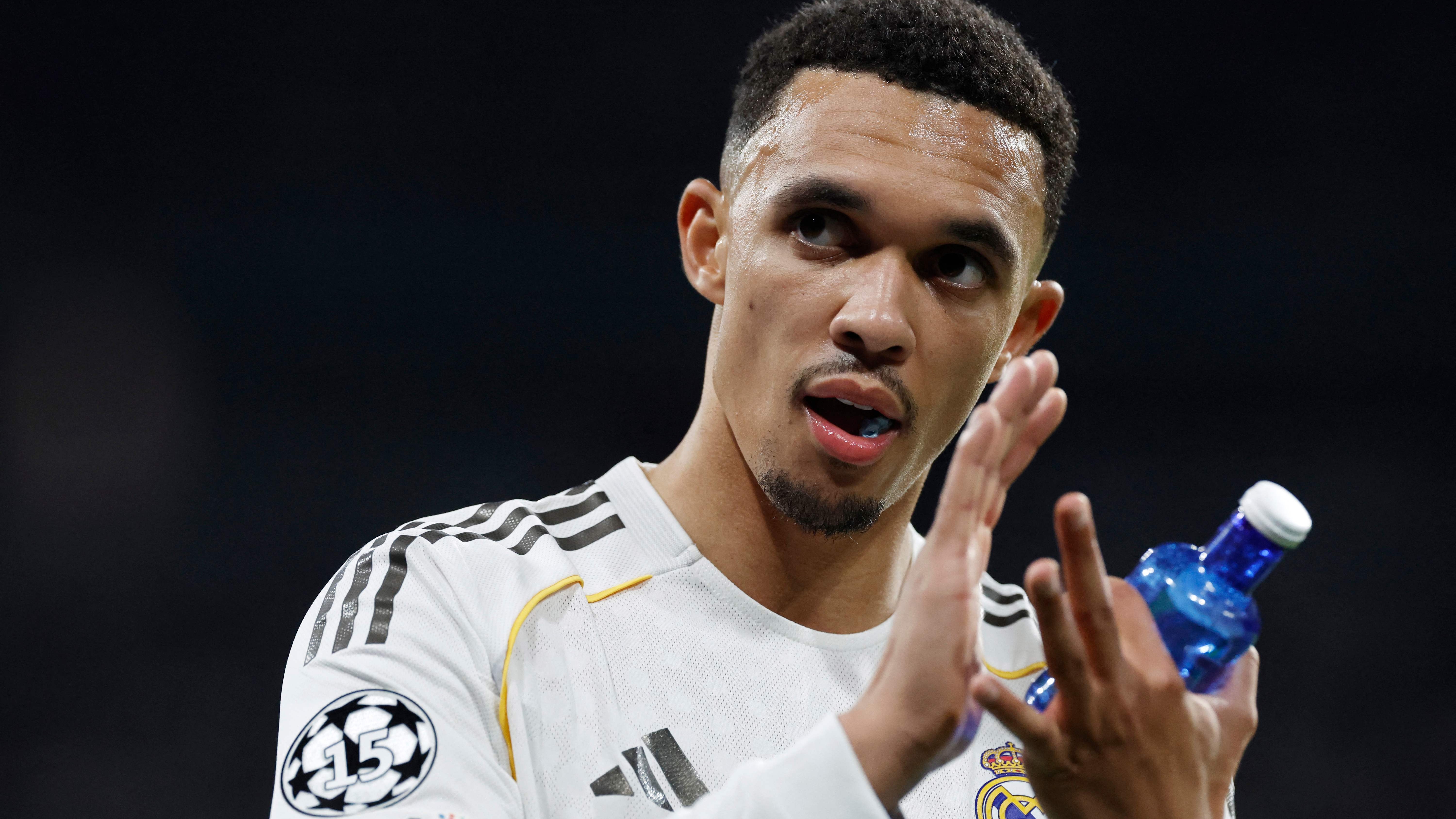 Real Madrid's English defender #12 Trent Alexander-Arnold is substituted during the UEFA Champions League last 16 first leg football match between Real Madrid CF and Manchester City at Santiago Bernabeu Stadium in Madrid on March 11, 2026. (Photo by Oscar DEL POZO / AFP)