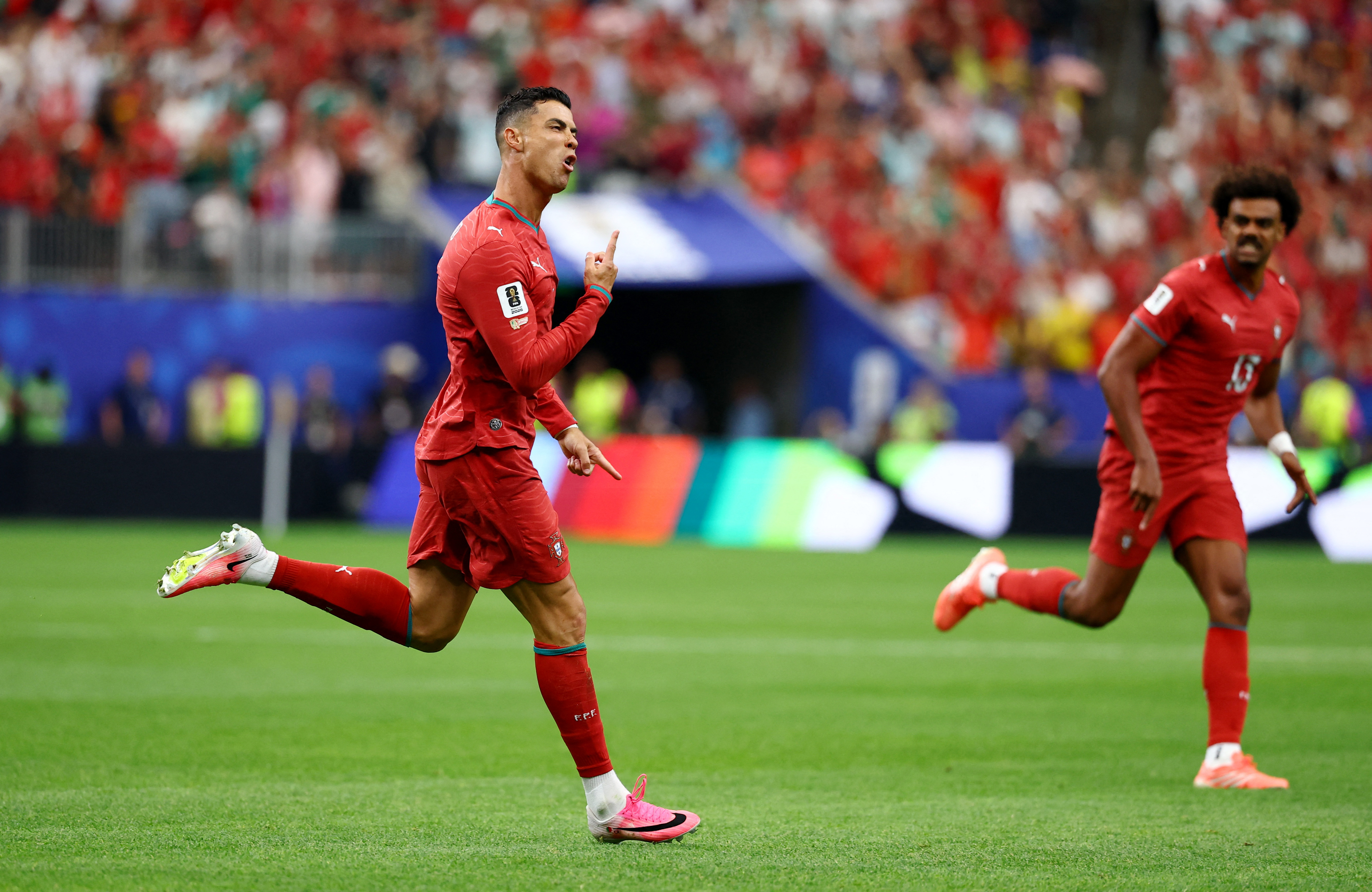 Soccer Football - FIFA World Cup 2026 - Group K - Portugal v Uzbekistan - Houston Stadium, Houston, Texas, U.S. - June 23, 2026 Portugal's Cristiano Ronaldo celebrates scoring their first goal REUTERS/Pedro Nunes