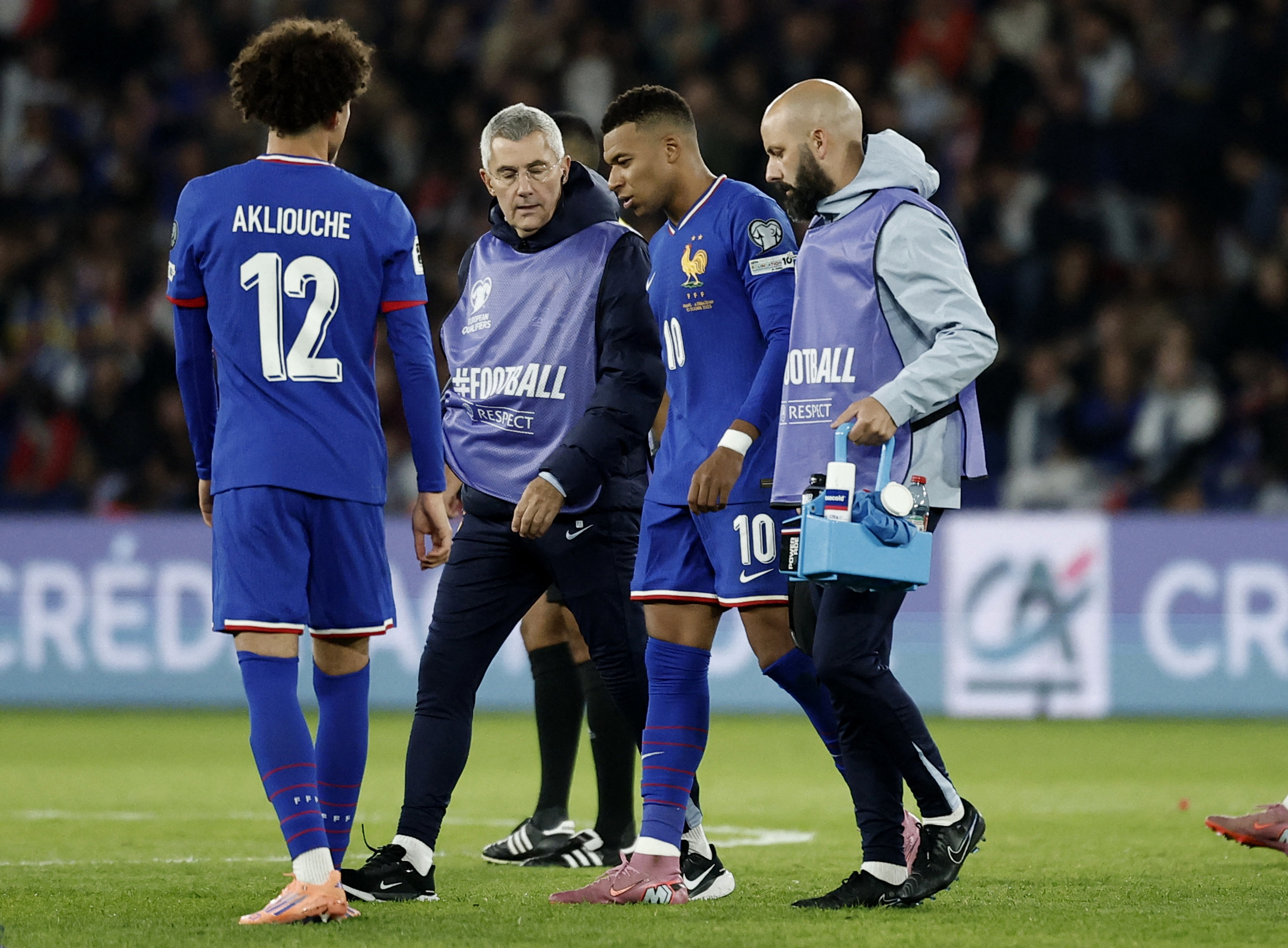 Soccer Football - FIFA World Cup - UEFA Qualifiers - Group D - France v Azerbaijan - Parc des Princes, Paris, France - October 10, 2025 France's Kylian Mbappe reacts after sustaining an injury REUTERS/Benoit Tessier