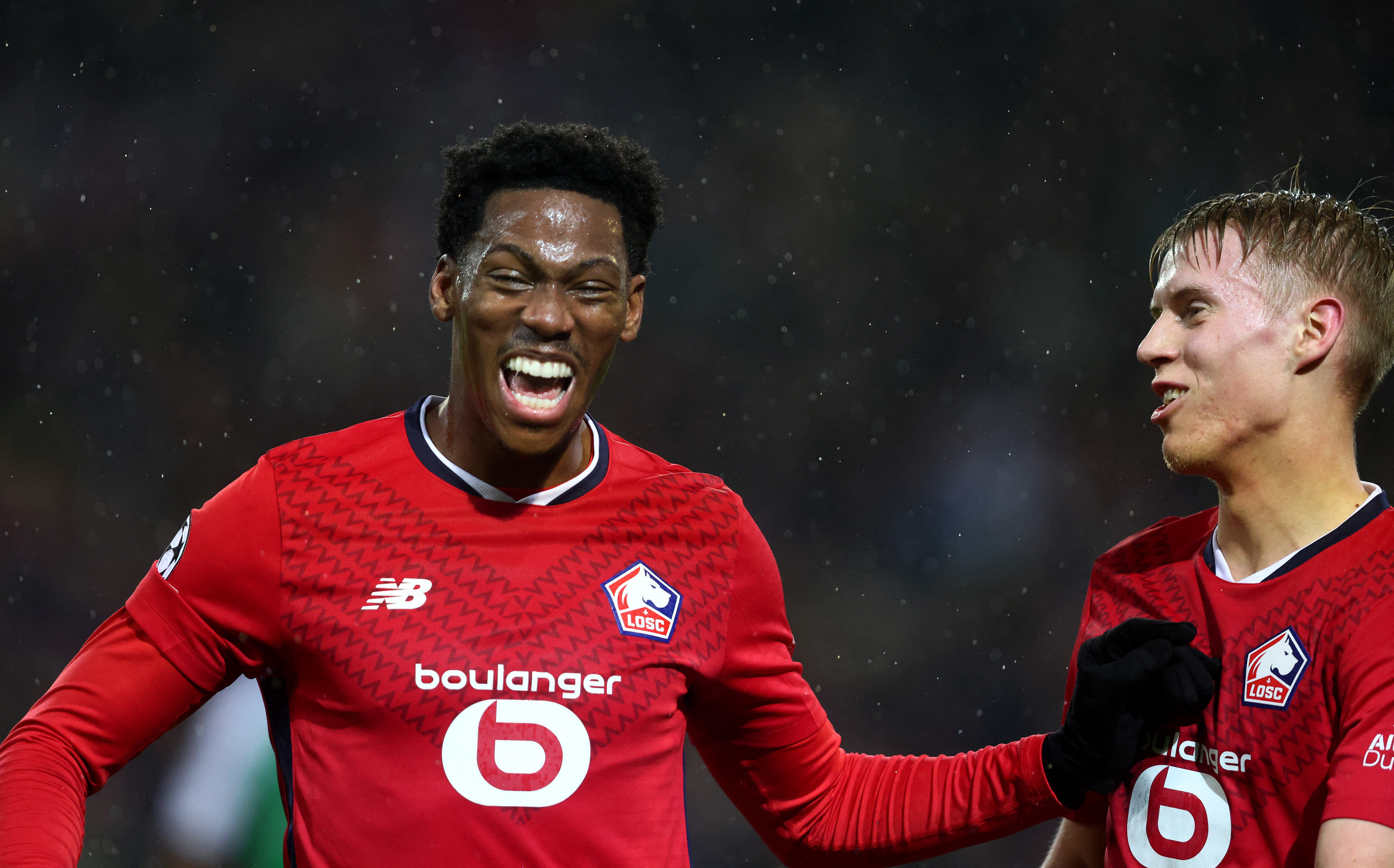 Soccer Football - Champions League - Lille v Feyenoord - Decathlon Arena Stade Pierre-Mauroy, Villeneuve-d'Ascq, France - January 29, 2025 Lille's Jonathan David celebrates scoring their fourth goal REUTERS/Johanna Geron