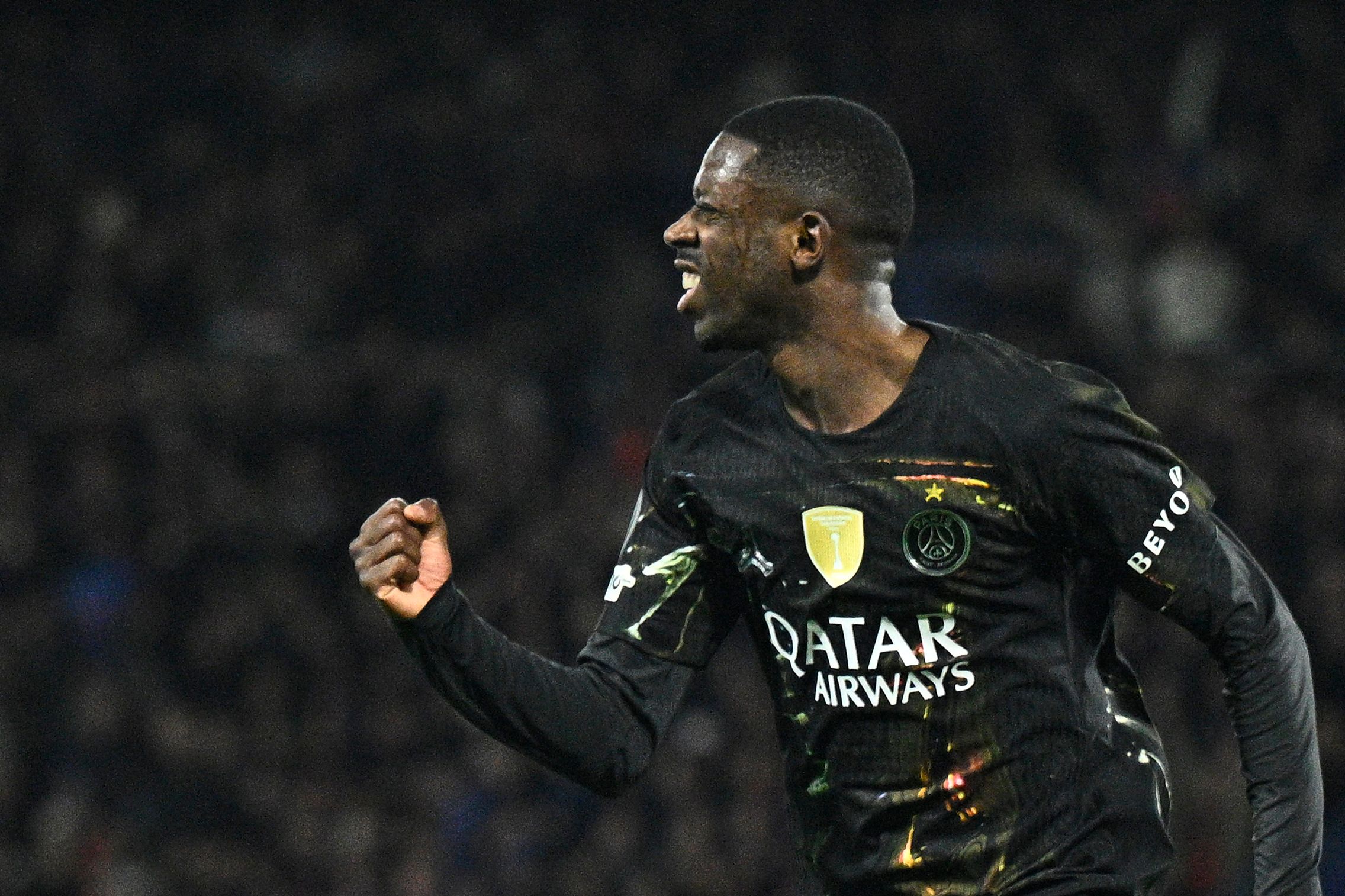 Paris Saint-Germain's French forward #10 Ousmane Dembele celebrates after scoring his side's second goal during the UEFA Champions League round of 16 first leg football match between Paris Saint-Germain (PSG) and Chelsea at the Parc des Princes stadium in Paris on March 11, 2026. (Photo by JULIEN DE ROSA / AFP)