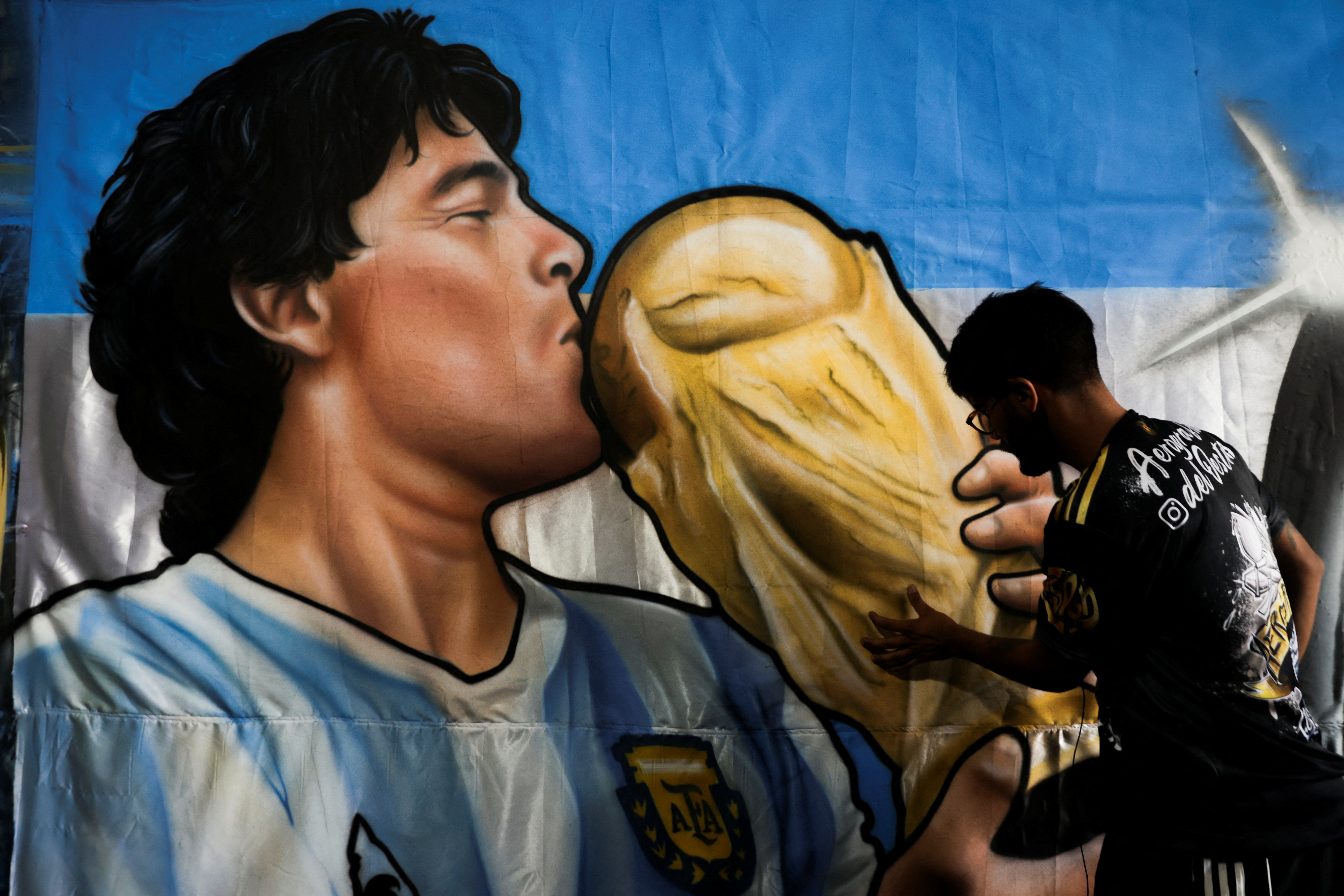 Going to work with Pele, Maradona and Zidane: Street artist