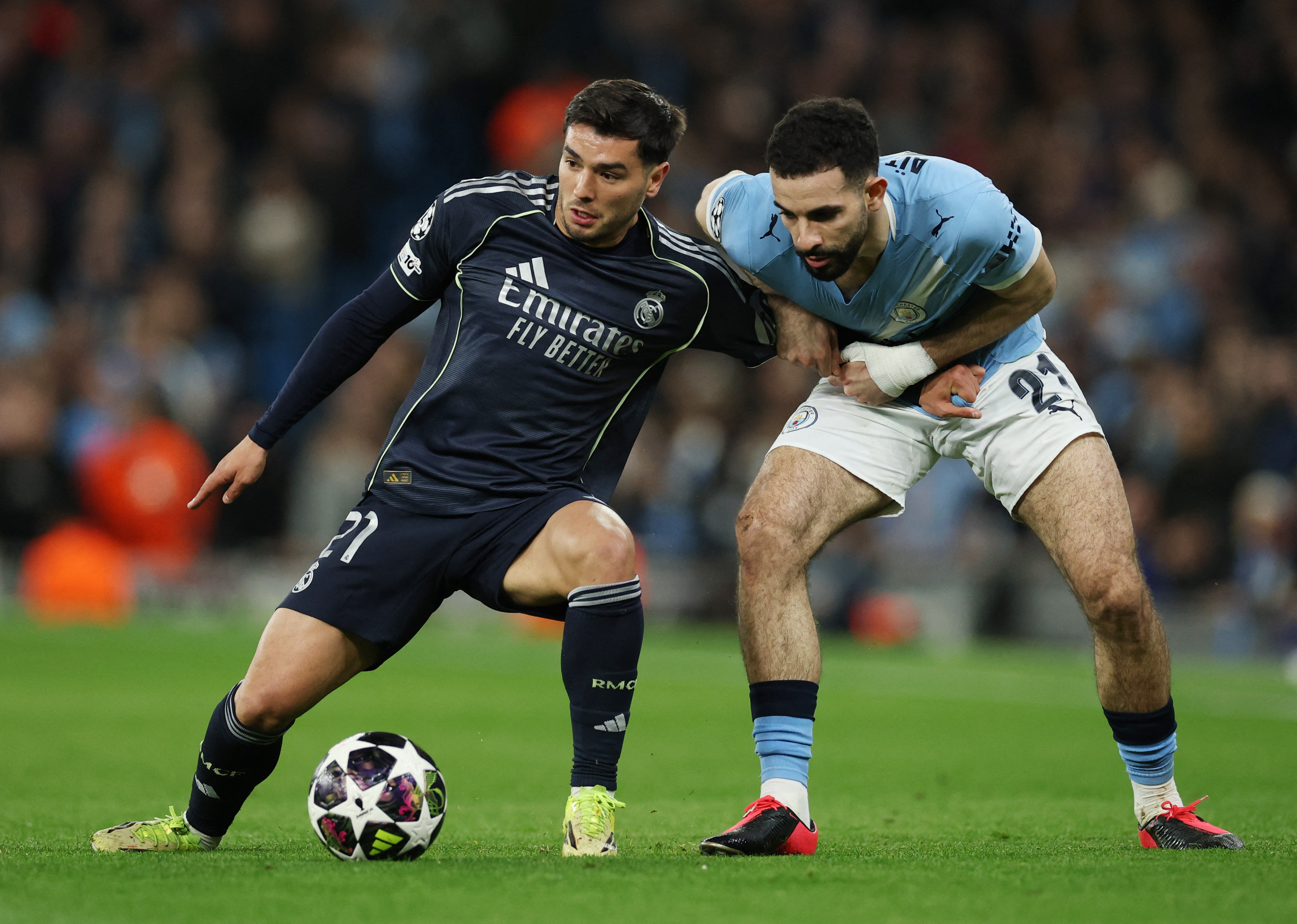 Soccer Football - UEFA Champions League - Round 16 - Second Leg - Manchester City v Real Madrid - Etihad Stadium, Manchester, Britain - March 17, 2026 Real Madrid's Brahim Diaz in action with Manchester City's Rayan Ait-Nouri REUTERS/Phil Noble