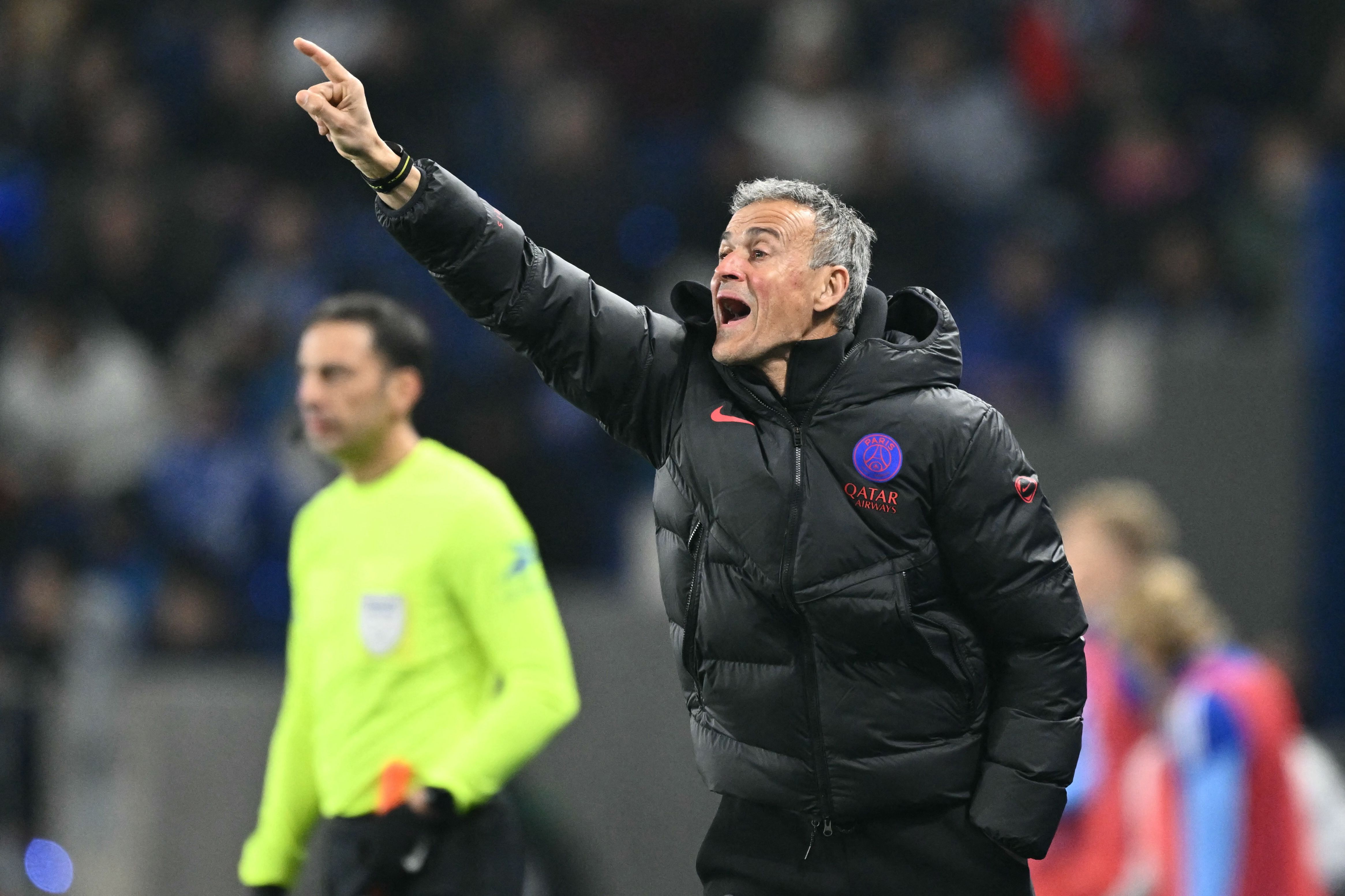 Paris Saint-Germain's Spanish headcoach Luis Enrique reacts during the French L1 football match between RC Strasbourg Alsace and Paris Saint-Germain (PSG) at the Stade de la Meinau in Strasbourg, eastern France, on February 1, 2026. (Photo by SEBASTIEN BOZON / AFP)