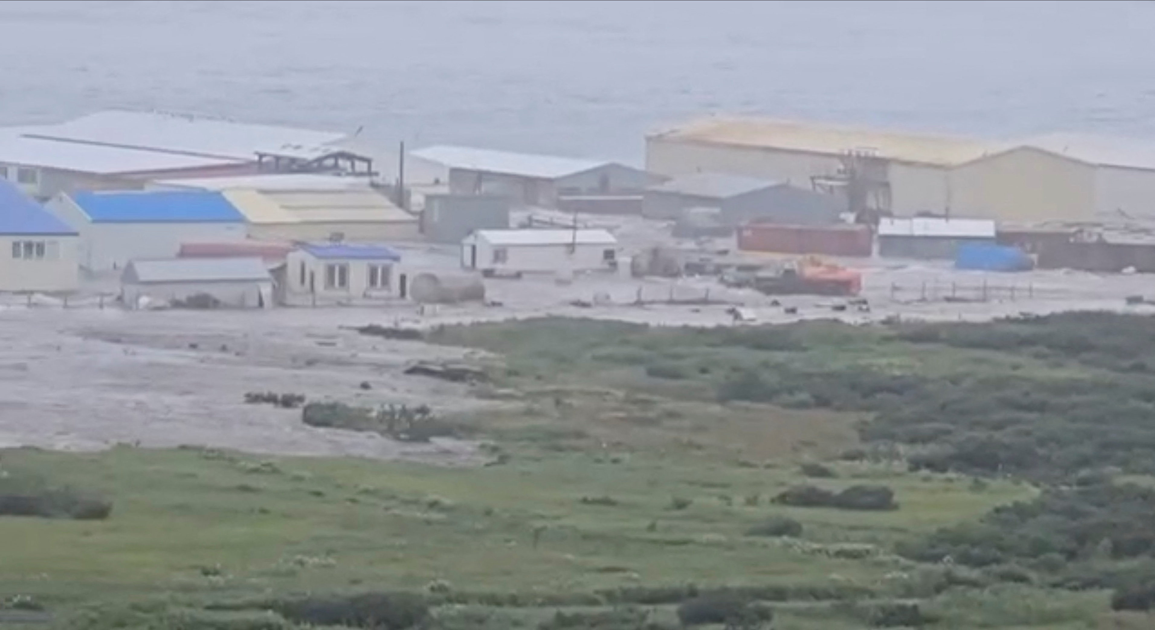 A powerful wave washes past a building located near the shore, after a powerful earthquake struck off the Kamchatka Peninsula, in Severo-Kurilsk, Sakhalin Region, Russia July 30, 2025 in this screen grab obtained from social media video Social media/via REUTERS  THIS IMAGE HAS BEEN SUPPLIED BY A THIRD PARTY. NO RESALES. NO ARCHIVES. NEWS USE ONLY   Reuters was able to confirm the location by buildings, water body and terrain which match with satellite images. Reuters was able to confirm the date by the corroborating local reports and official statements