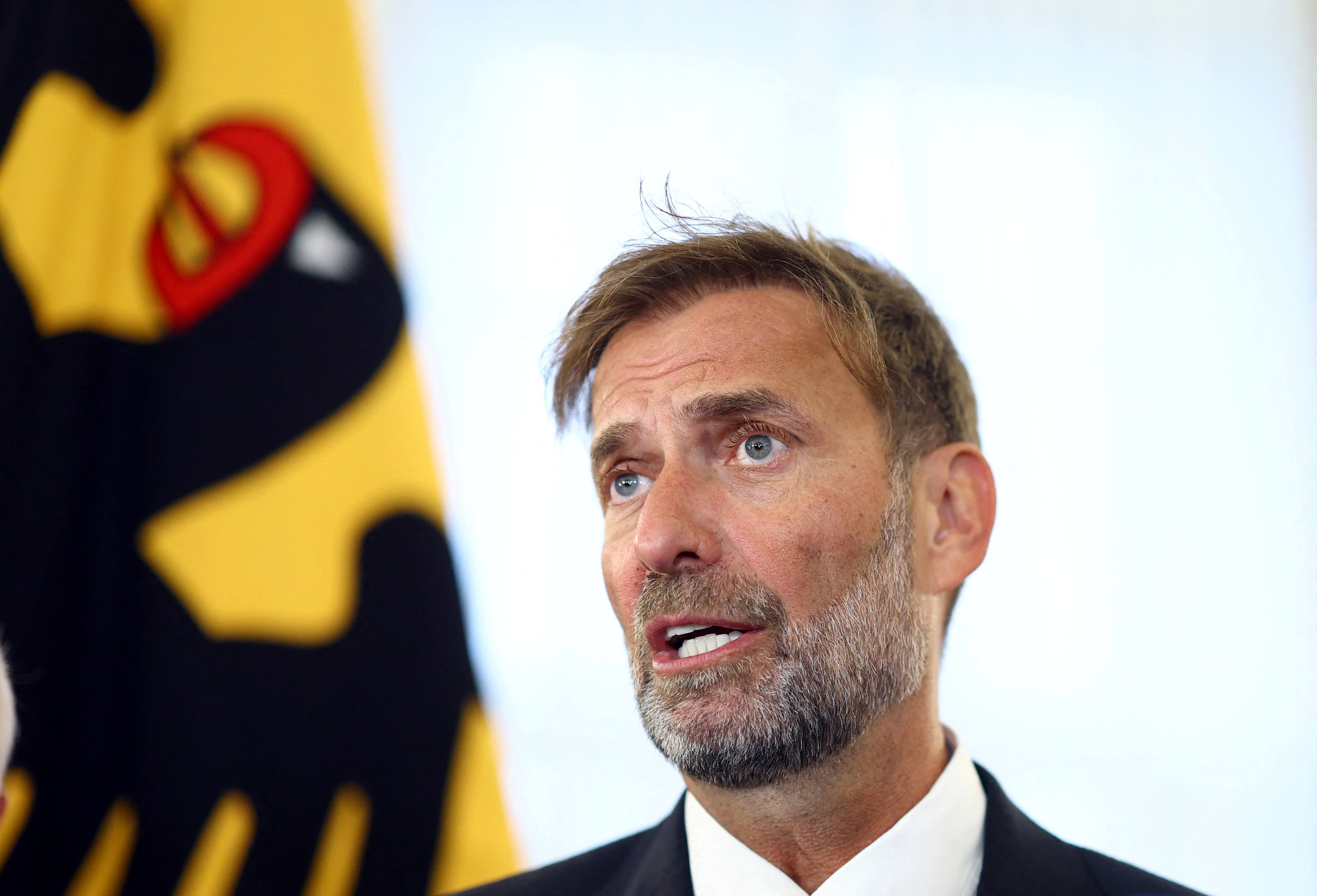 Former FC Liverpool manager Juergen Klopp reacts after receiving the Order of Merit of the Federal Republic of Germany at Bellevue Palace to mark the unification day in Berlin, October 1, 2024. REUTERS/Lisi Niesner