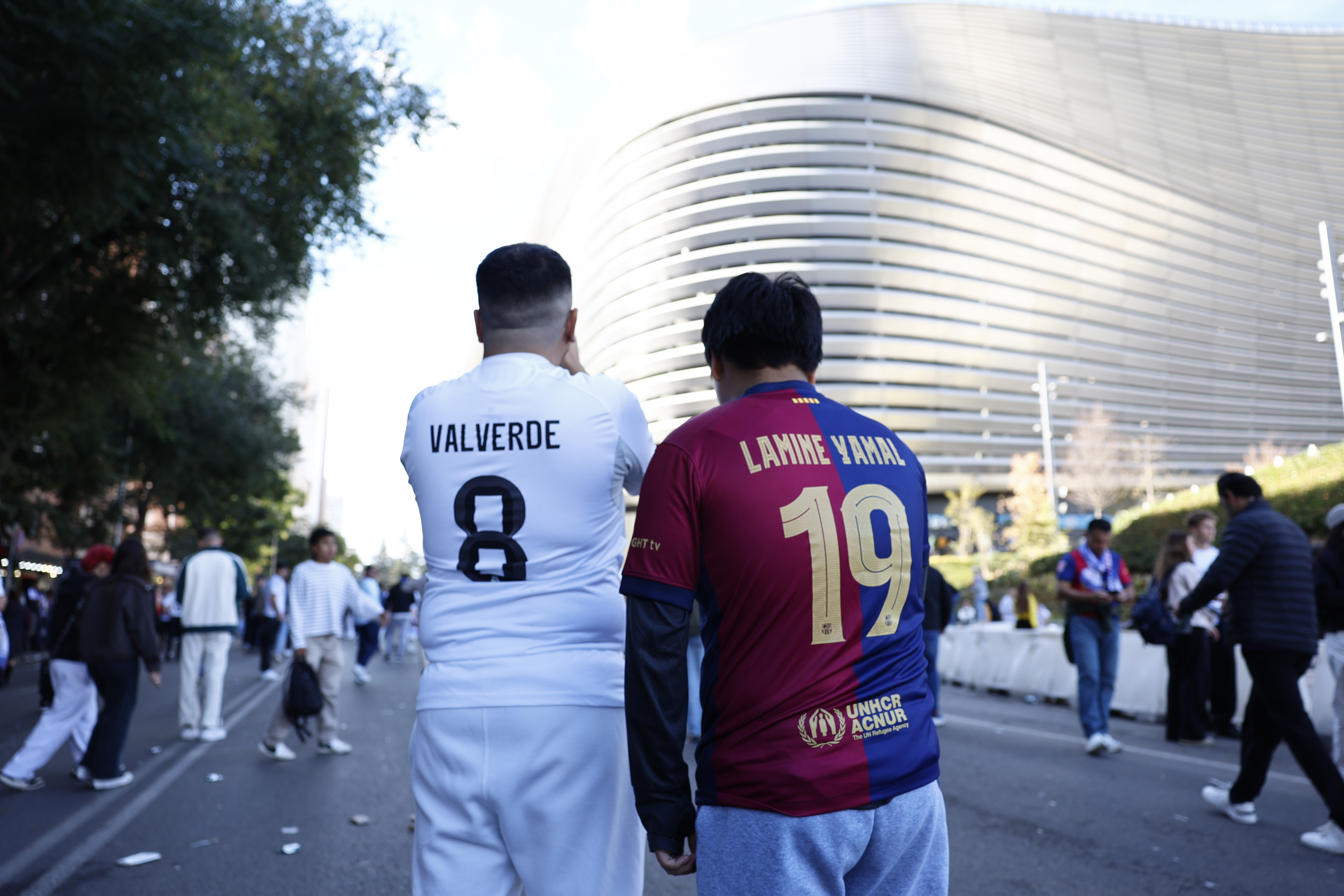 Fans of Real Madrid and FC Barcelona gather at the stadium.