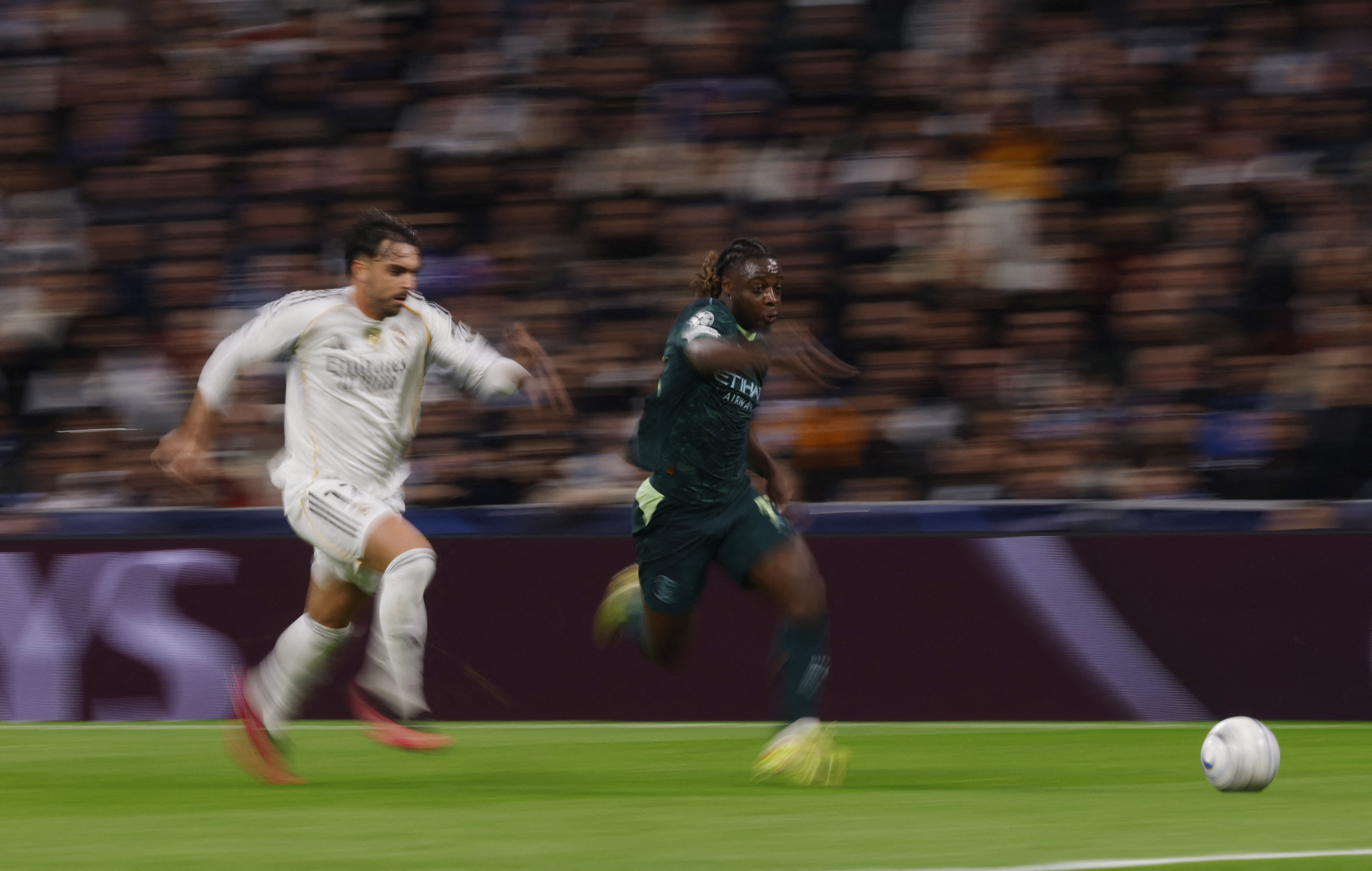 Soccer Football - UEFA Champions League - Real Madrid v Manchester City - Santiago Bernabeu, Madrid, Spain - December 10, 2025 Manchester City's Jeremy Doku in action Action Images via Reuters/Andrew Couldridge