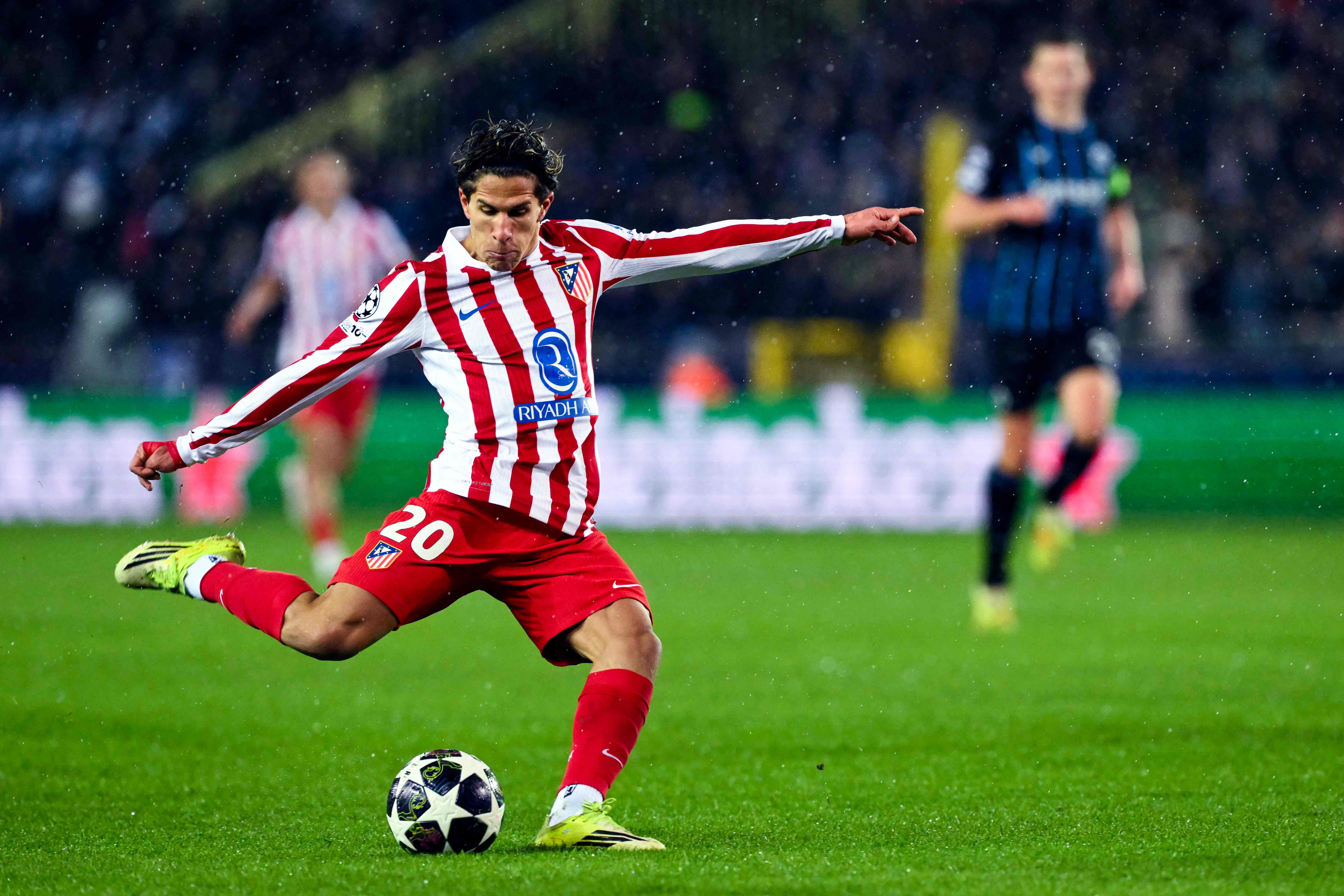 Atletico Madrid's Argentine forward #22 Giuliano Simeone shoots the ball during the UEFA Champions League knockout round play-off first leg football match between Club Brugge and Atletico Madrid at the Jan Breydel Stadium in Brugge on February 18, 2026. (Photo by NICOLAS TUCAT / AFP)
