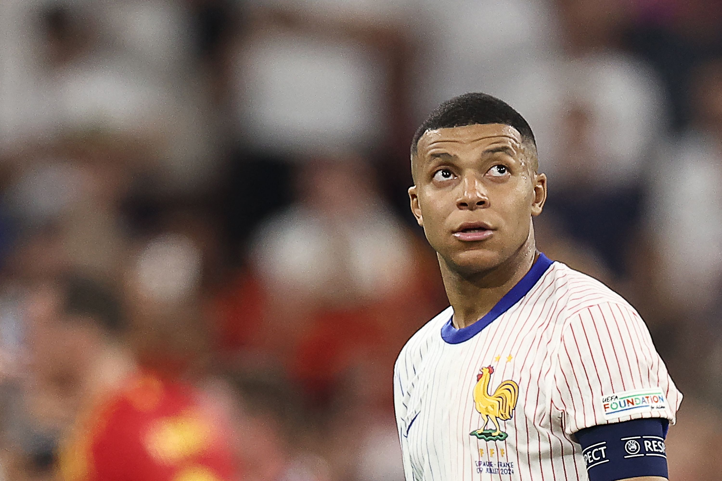 France's forward #10 Kylian Mbappe reacts after losing the UEFA Euro 2024 semi-final football match between Spain and France at the Munich Football Arena in Munich on July 9, 2024. (Photo by FRANCK FIFE / AFP)