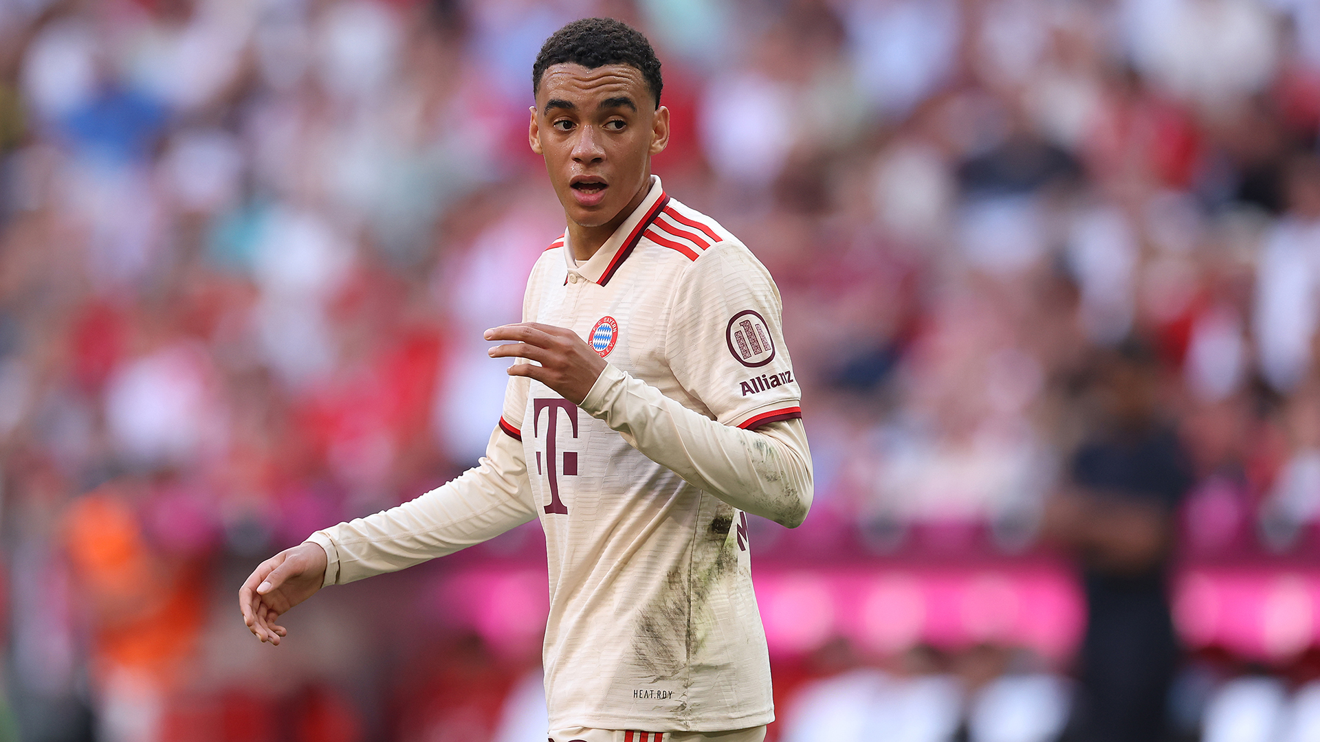 MUNICH, GERMANY - SEPTEMBER 01: Jamal Musiala of FC Bayern München looks on during the Bundesliga match between FC Bayern München and Sport-Club Freiburg at Allianz Arena on September 01, 2024 in Munich, Germany. (Photo by Alexander Hassenstein/Getty Images)