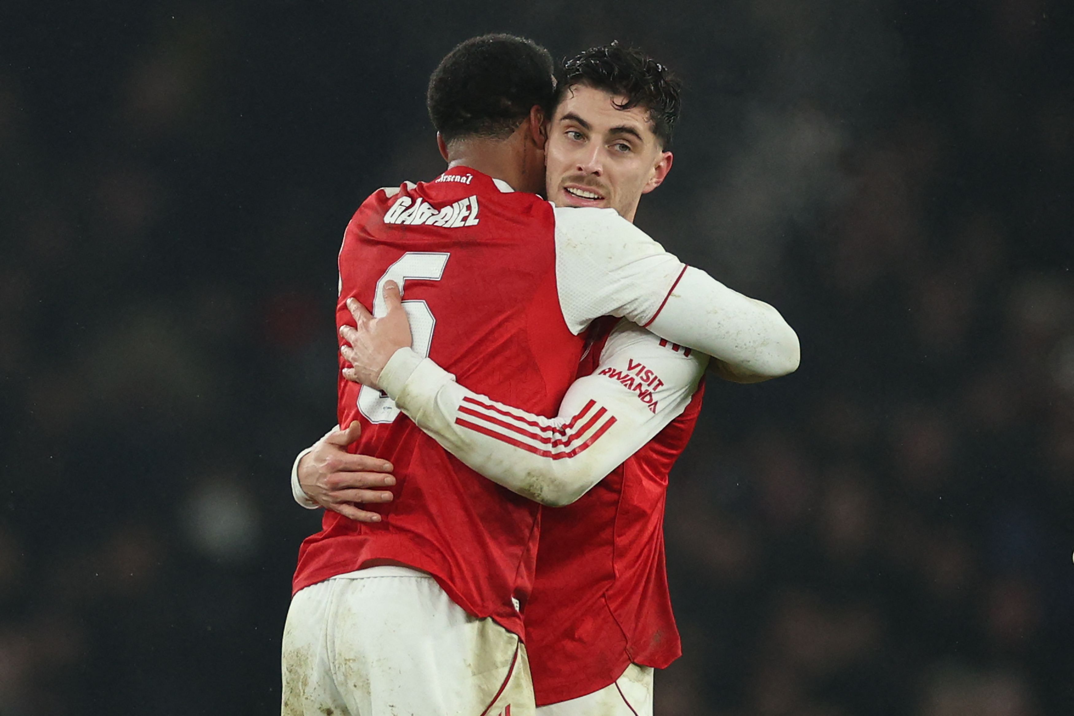 Arsenal's German midfielder #29 Kai Havertz (R) celebrates with Arsenal's Brazilian defender #06 Gabriel Magalhaes (L) after the English League Cup semi final second leg, football match between Arsenal and Chelsea at the Emirates Stadium, in London on February 3, 2026. Arsenal won the game 1-0, and the tie 4-2 on aggregate. (Photo by Adrian Dennis / AFP) / RESTRICTED TO EDITORIAL USE. No use with unauthorized audio, video, data, fixture lists, club/league logos or 'live' services. Online in-match use limited to 120 images. An additional 40 images may be used in extra time. No video emulation. Social media in-match use limited to 120 images. An additional 40 images may be used in extra time. No use in betting publications, games or single club/league/player publications. /