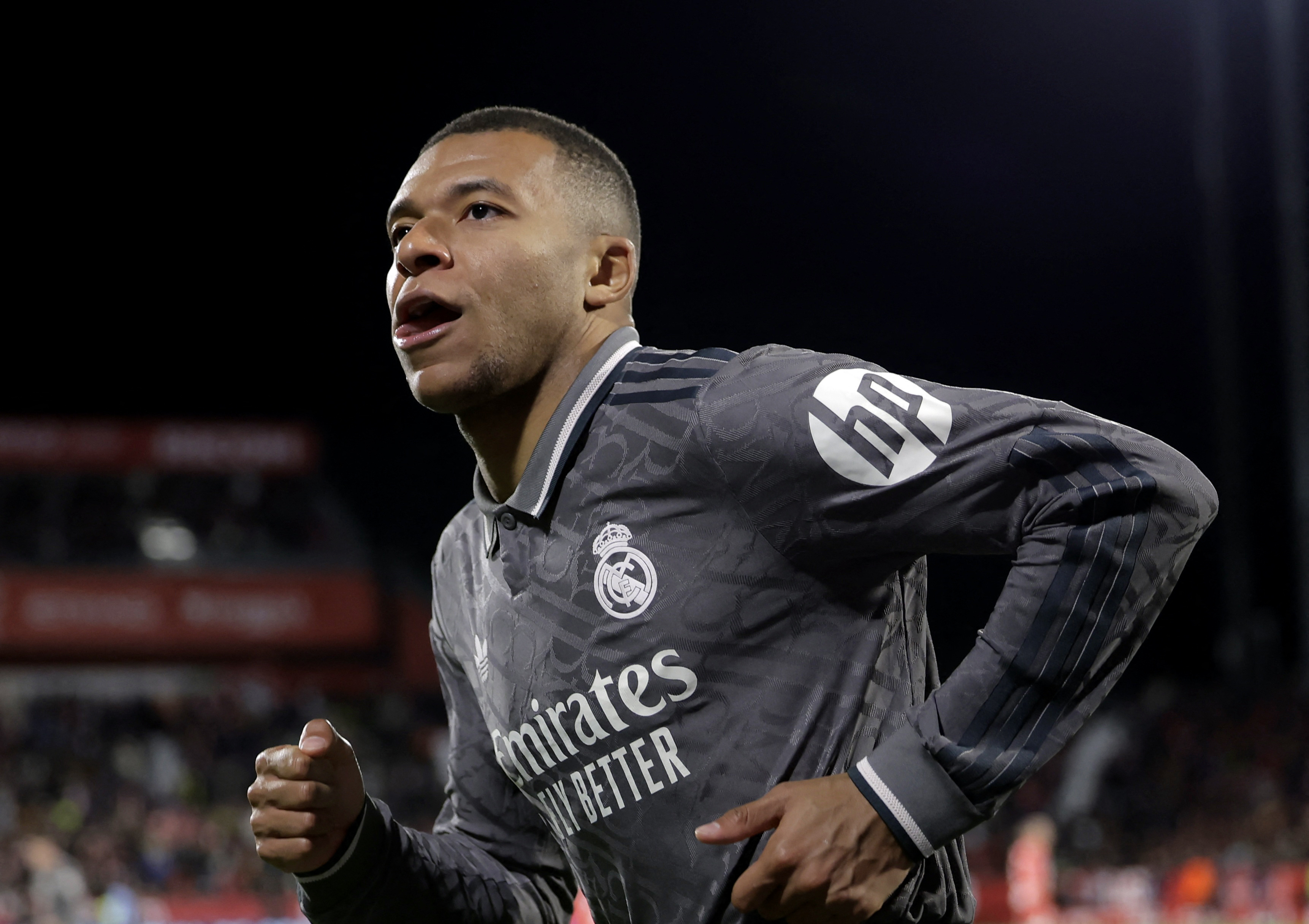 Soccer Football - LaLiga - Girona v Real Madrid - Estadi Montilivi, Girona, Spain - December 7, 2024 Real Madrid's Kylian Mbappe celebrates scoring their third goal REUTERS/Jon Nazca