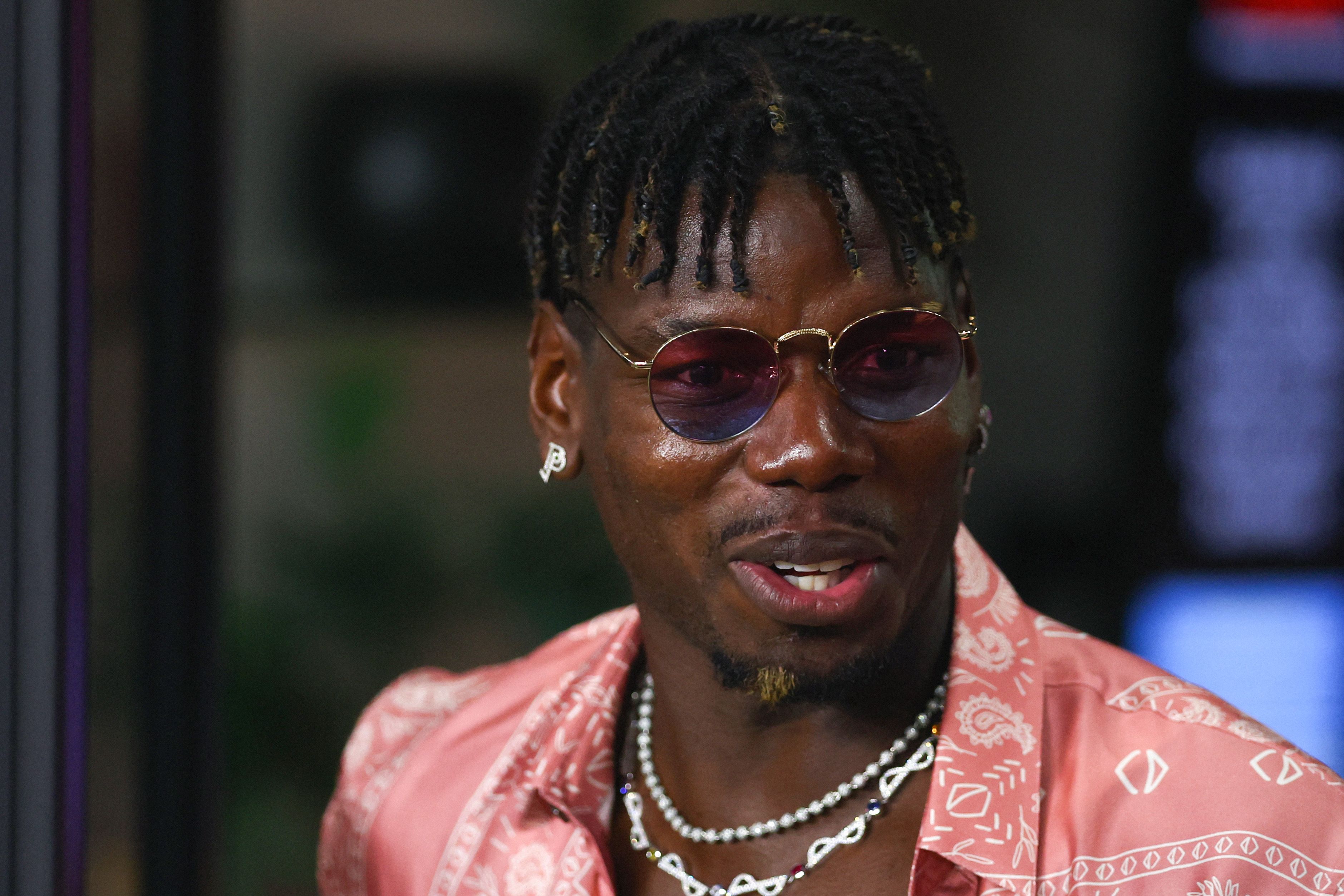 FORT LAUDERDALE, FLORIDA - SEPTEMBER 28: French soccer player Paul Pogba attends a game between Charlotte FC and Inter Miami at Chase Stadium on September 28, 2024 in Fort Lauderdale, Florida.   Megan Briggs/Getty Images/AFP (Photo by Megan Briggs / GETTY IMAGES NORTH AMERICA / Getty Images via AFP)