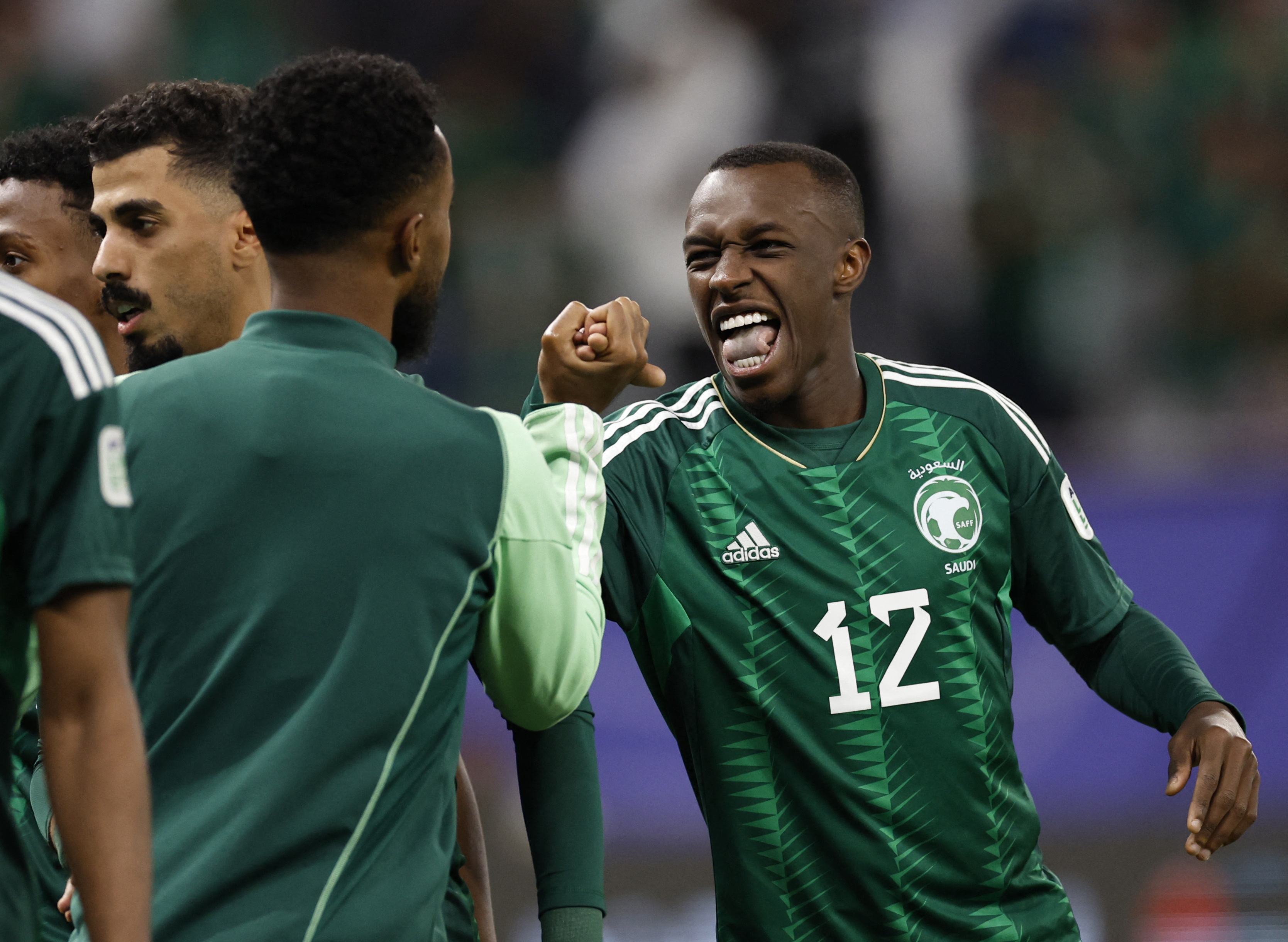 Soccer Football - AFC Asian Cup - Round of 16 - Saudi Arabia v South Korea - Education City Stadium, Al Rayyan, Qatar - January 30, 2024 Saudi Arabia's Saud Abdulhamid celebrates after Abdullah Radif scores their first goal REUTERS/Thaier Al-Sudani