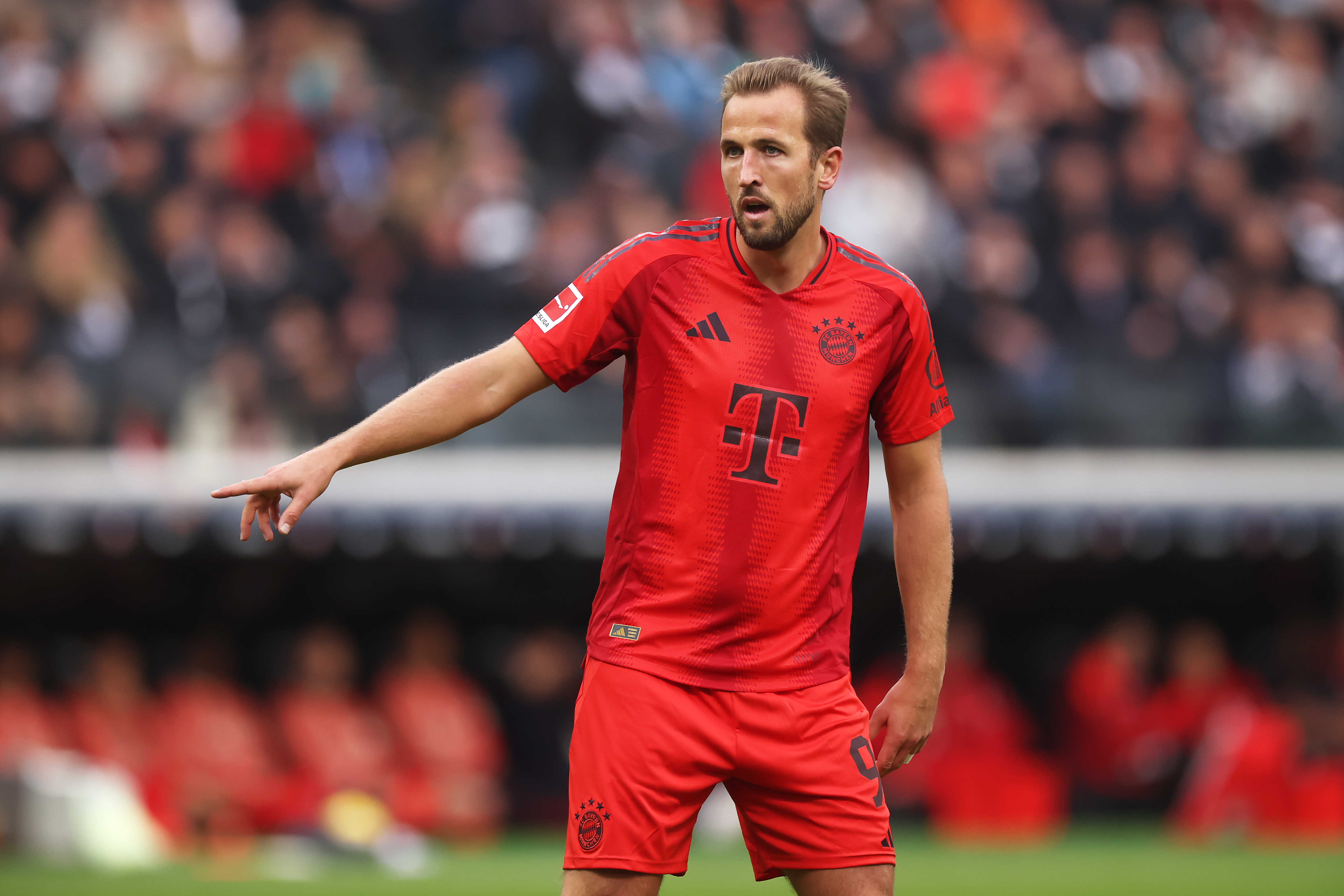 FRANKFURT AM MAIN, GERMANY - OCTOBER 06: Harry Kane of Bayern Munich reacts during the Bundesliga match between Eintracht Frankfurt and FC Bayern München at Deutsche Bank Park on October 06, 2024 in Frankfurt am Main, Germany. (Photo by Alex Grimm/Getty Images)