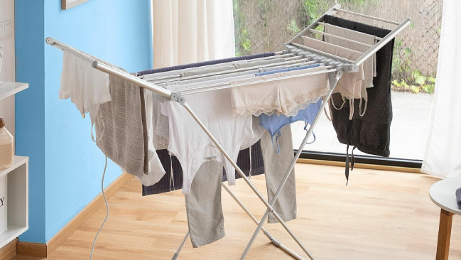Tu ropa, seca en un instante con este tendedero eléctrico plegable -  Showroom