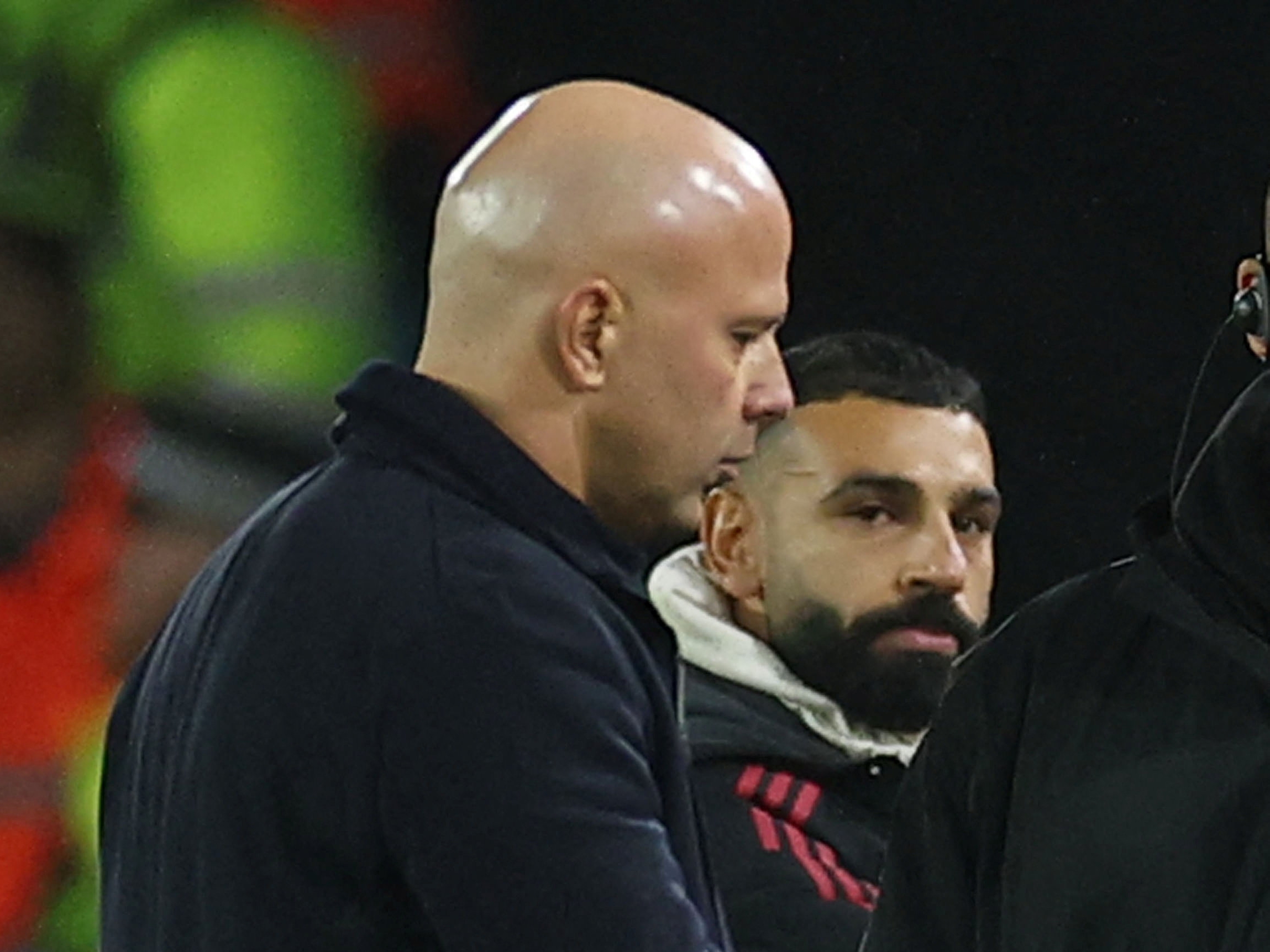 Soccer Football - Premier League - Leeds United v Liverpool - Elland Road, Leeds, Britain - December 6, 2025 Liverpool manager Arne Slot and Mohamed Salah after the match Action Images via Reuters/Andrew Boyers  EDITORIAL USE ONLY. NO USE WITH UNAUTHORIZED AUDIO, VIDEO, DATA, FIXTURE LISTS, CLUB/LEAGUE LOGOS OR 'LIVE' SERVICES. ONLINE IN-MATCH USE LIMITED TO 120 IMAGES, NO VIDEO EMULATION. NO USE IN BETTING, GAMES OR SINGLE CLUB/LEAGUE/PLAYER PUBLICATIONS. PLEASE CONTACT YOUR ACCOUNT REPRESENTATIVE FOR FURTHER DETAILS..