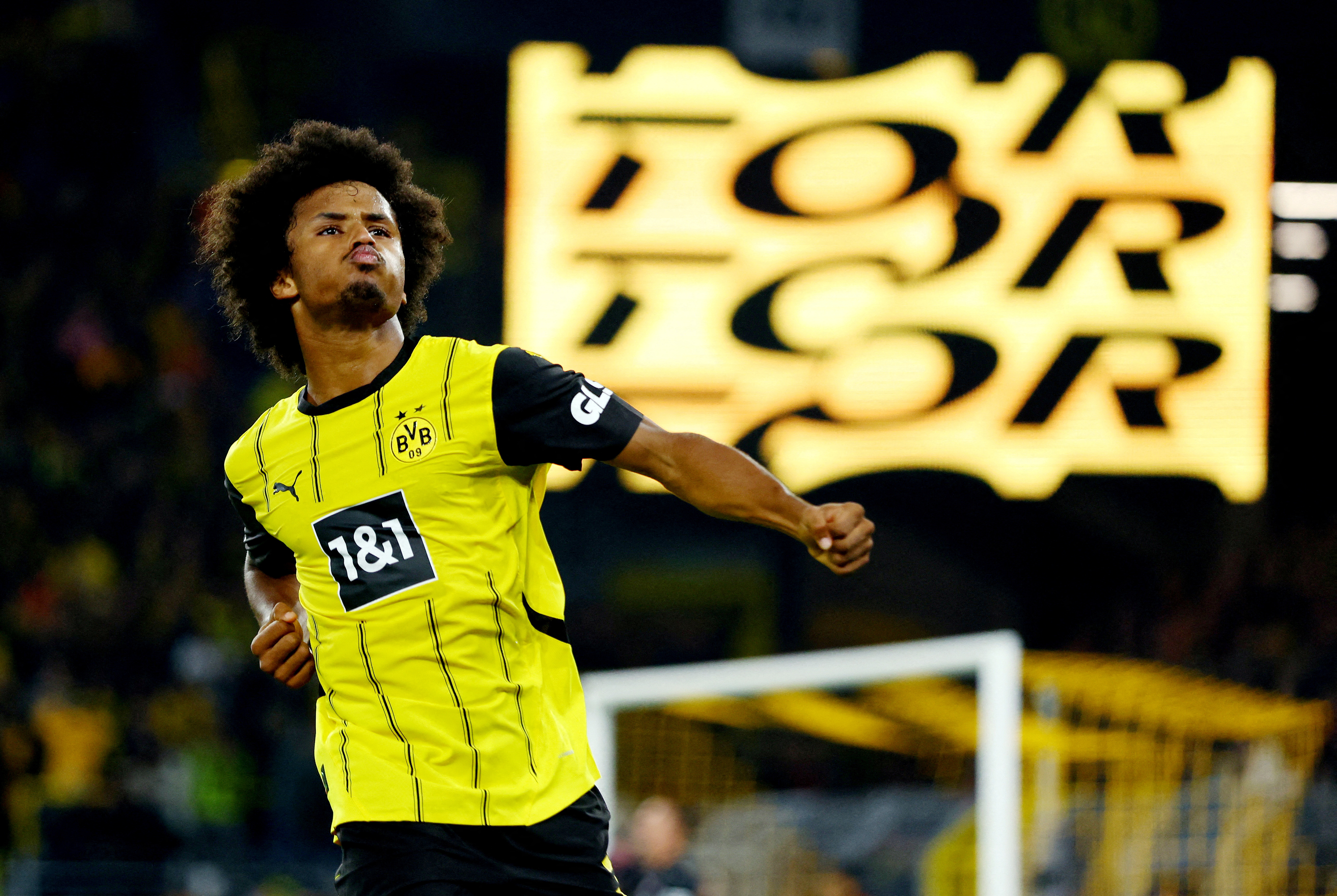 Soccer Football - Bundesliga - Borussia Dortmund v 1. FC Heidenheim - Signal Iduna Park, Dortmund, Germany - September 13, 2024 Borussia Dortmund's Karim Adeyemi celebrates scoring their third goal REUTERS/Thilo Schmuelgen DFL REGULATIONS PROHIBIT ANY USE OF PHOTOGRAPHS AS IMAGE SEQUENCES AND/OR QUASI-VIDEO.     TPX IMAGES OF THE DAY