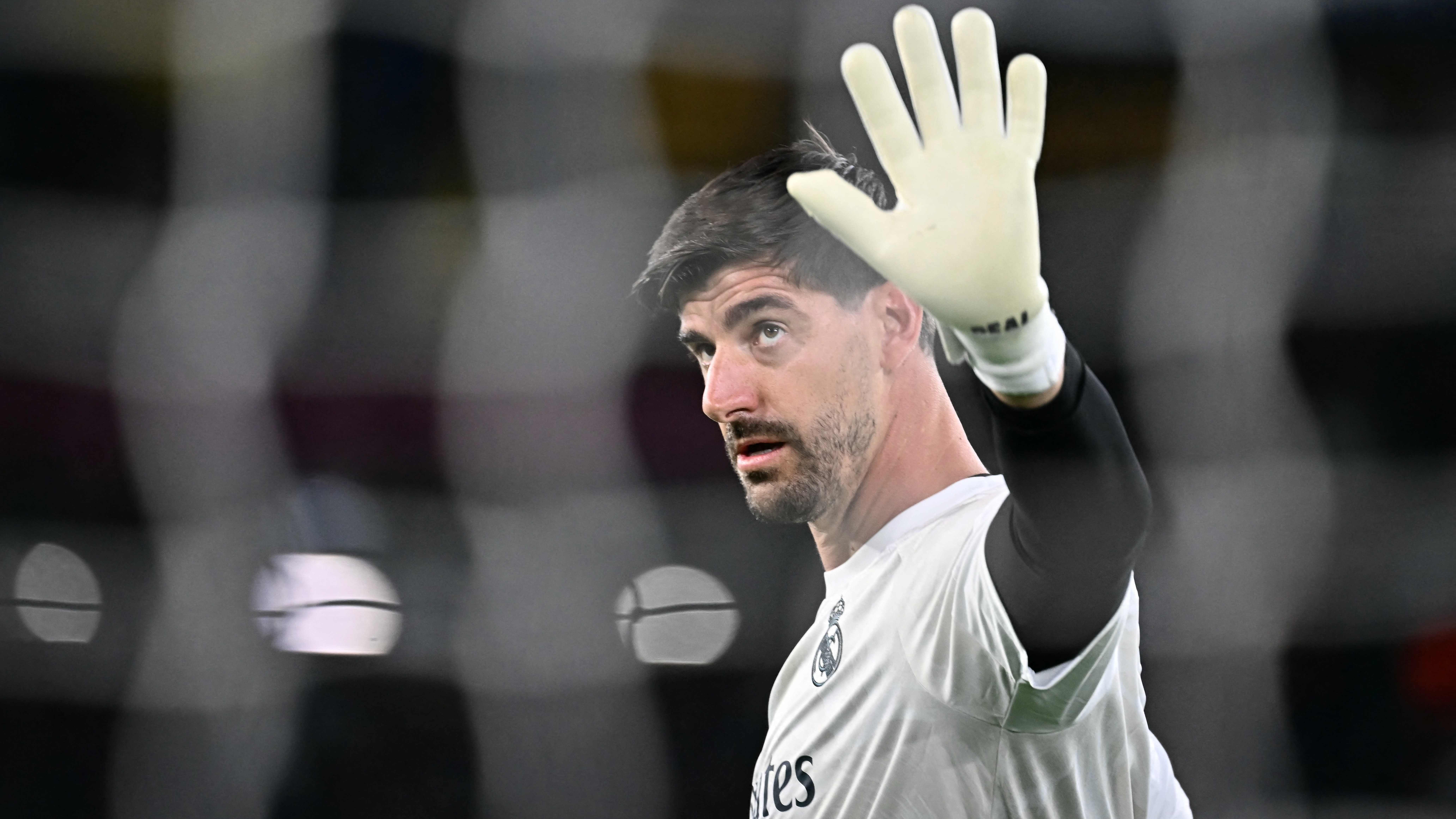 Real Madrid's Belgian goalkeeper #01 Thibaut Courtois warms up before the UEFA Champions Leaugue - 1st round day 2 football match between AS Roma and Real Madrid at the Olympic Stadium in Rome on October 14, 2026. (Photo by Filippo MONTEFORTE / AFP)