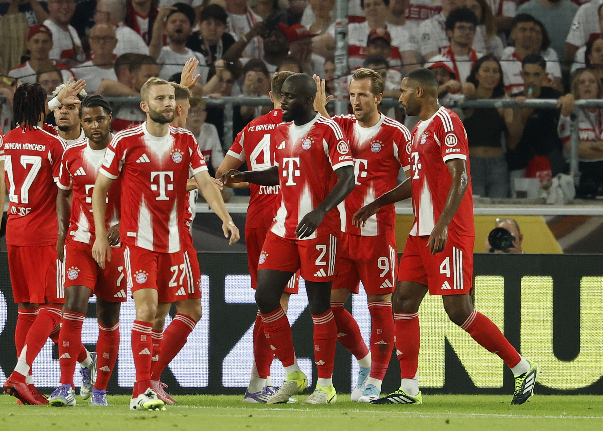 Soccer Football - Franz Beckenbauer Supercup 2025 - VFB Stuttgart v Bayern Munich - MHPArena, Stuttgart, Germany - August 16, 2025 Bayern Munich's Harry Kane celebrates scoring their first goal with teammates REUTERS/Heiko Becker