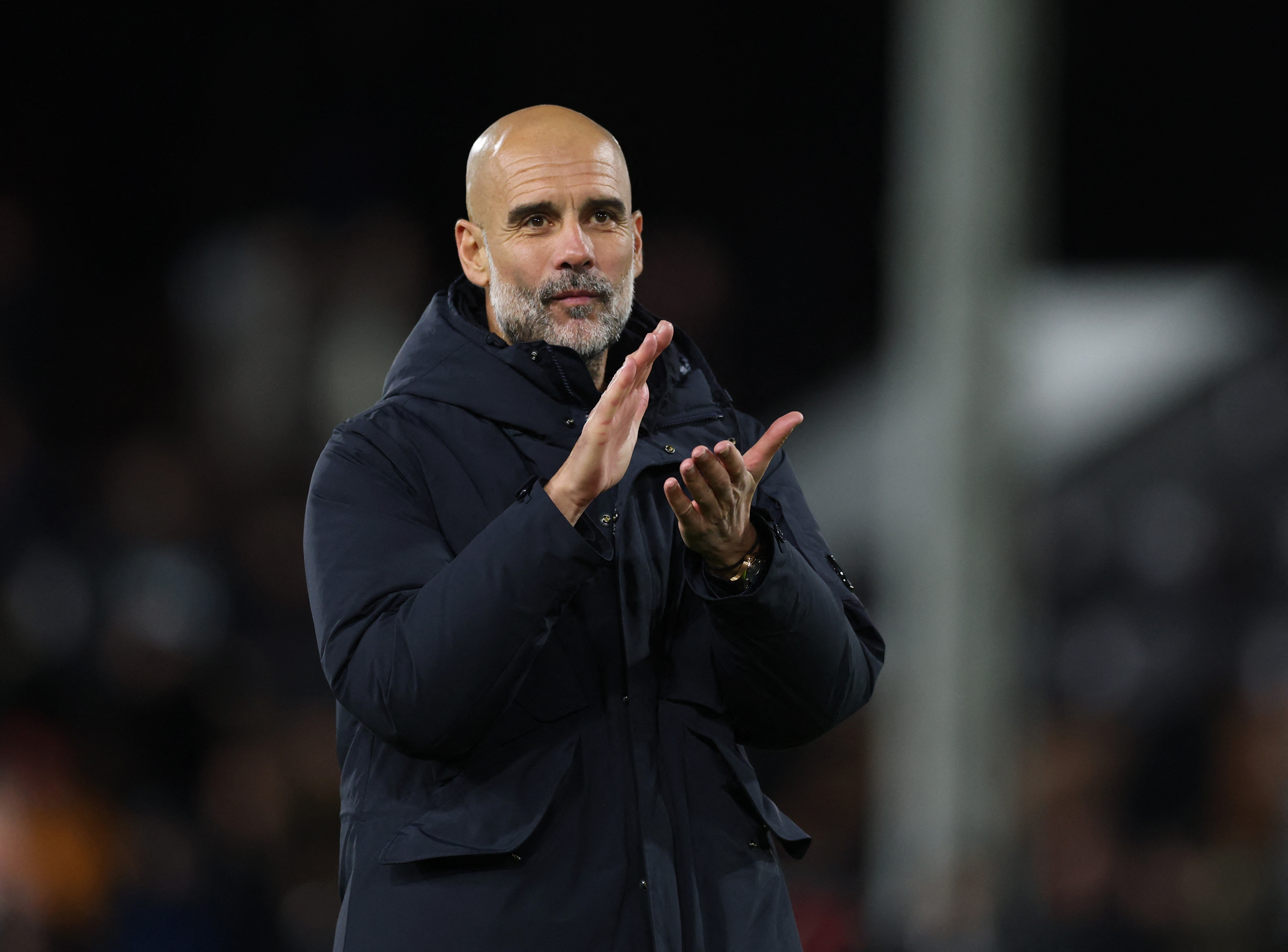 Soccer Football - Premier League - Fulham v Manchester City - Craven Cottage, London, Britain - December 2, 2025 Manchester City manager Pep Guardiola celebrates after the match Action Images via Reuters/Paul Childs EDITORIAL USE ONLY. NO USE WITH UNAUTHORIZED AUDIO, VIDEO, DATA, FIXTURE LISTS, CLUB/LEAGUE LOGOS OR 'LIVE' SERVICES. ONLINE IN-MATCH USE LIMITED TO 120 IMAGES, NO VIDEO EMULATION. NO USE IN BETTING, GAMES OR SINGLE CLUB/LEAGUE/PLAYER PUBLICATIONS. PLEASE CONTACT YOUR ACCOUNT REPRESENTATIVE FOR FURTHER DETAILS..