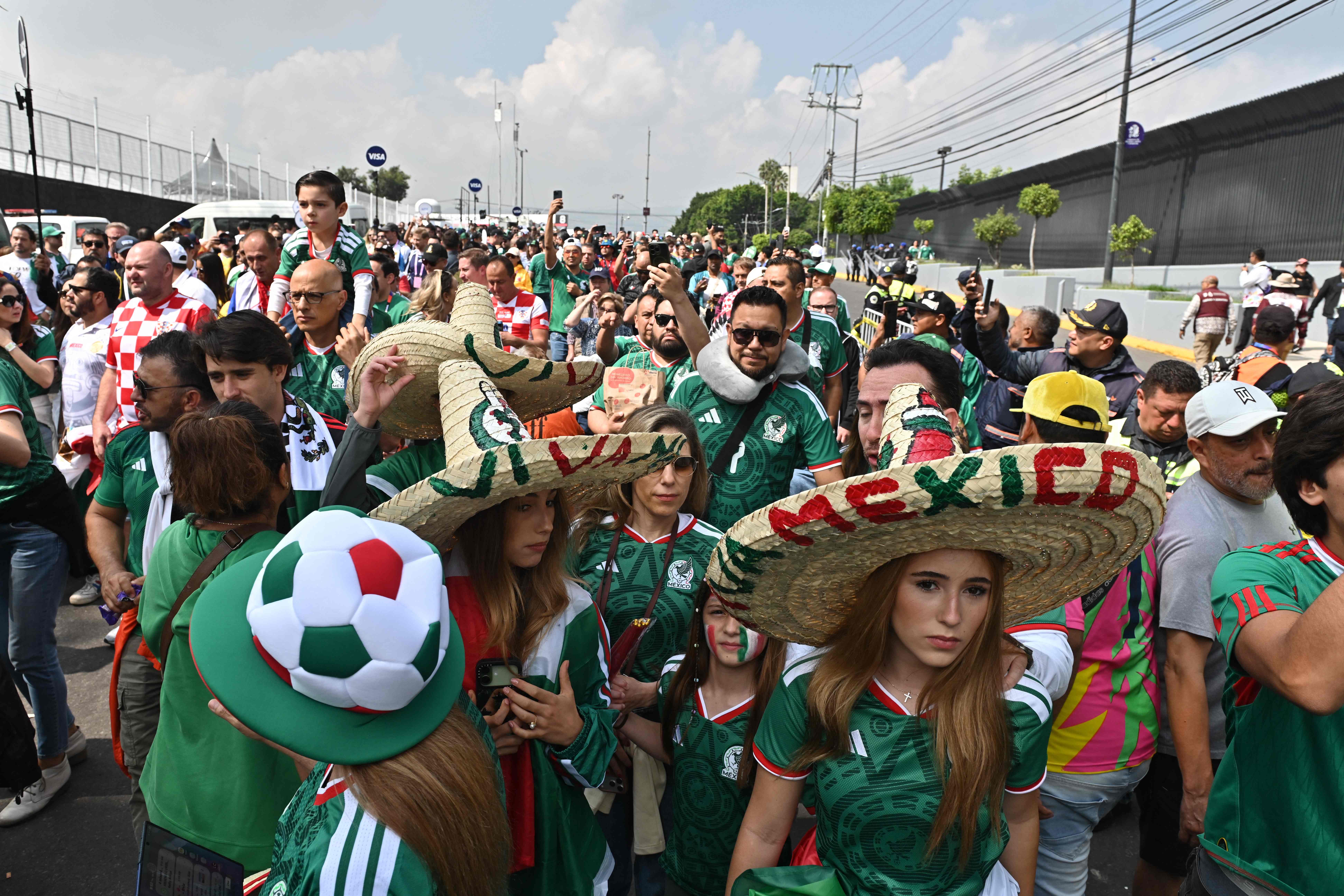 Mexico supporters gather outside the stadium ahead of the 2026 World Cup Group A football match between Mexico and South Africa at the Mexico City Stadium in Mexico City on June 11, 2026. (Photo by Mario Vazquez / AFP)