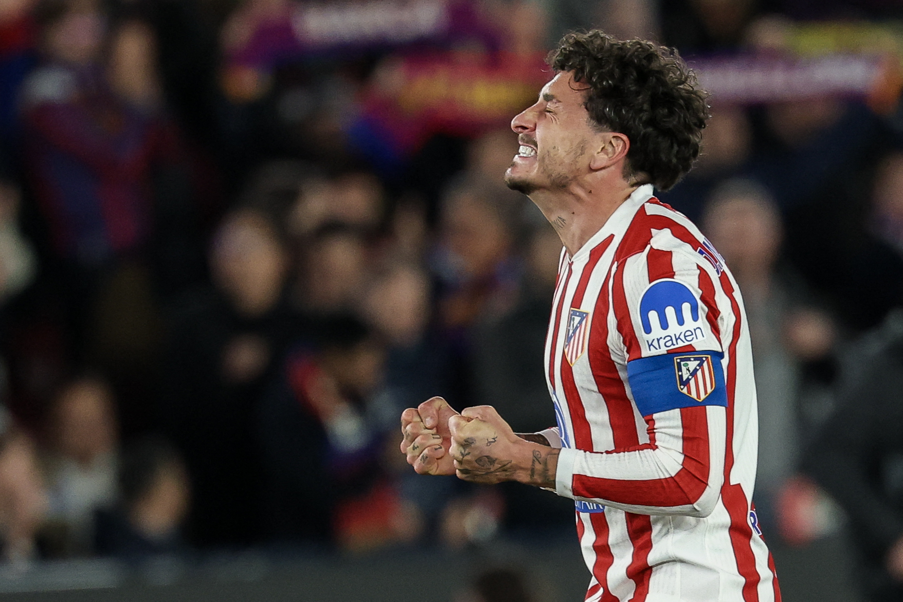 Atletico Madrid's Uruguayan defender #02 Jose Gimenez reacts at the end of the Copa del Rey (King's Cup) semi final second leg football match between FC Barcelona and Club Atletico de Madrid at Camp Nou Stadium in Barcelona on March 3, 2026. (Photo by Lluis GENE / AFP)