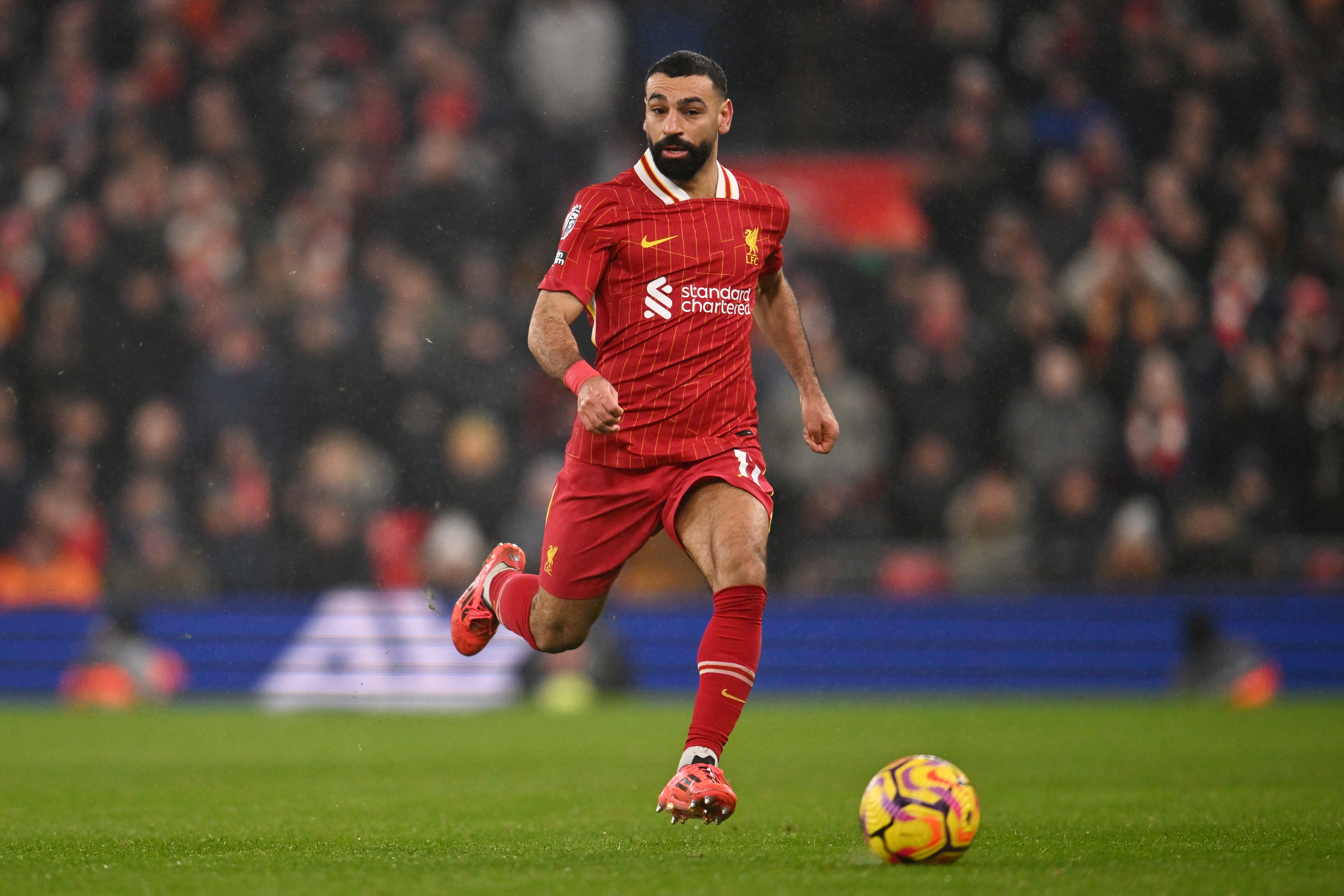 LIVERPOOL, ENGLAND - JANUARY 05: (THE SUN OUT, THE SUN ON SUNDAY OUT) Mohamed Salah of Liverpool runs with the ball during the Premier League match between Liverpool FC and Manchester United FC at Anfield on January 05, 2025 in Liverpool, England. (Photo by Liverpool FC/Liverpool FC via Getty Images)