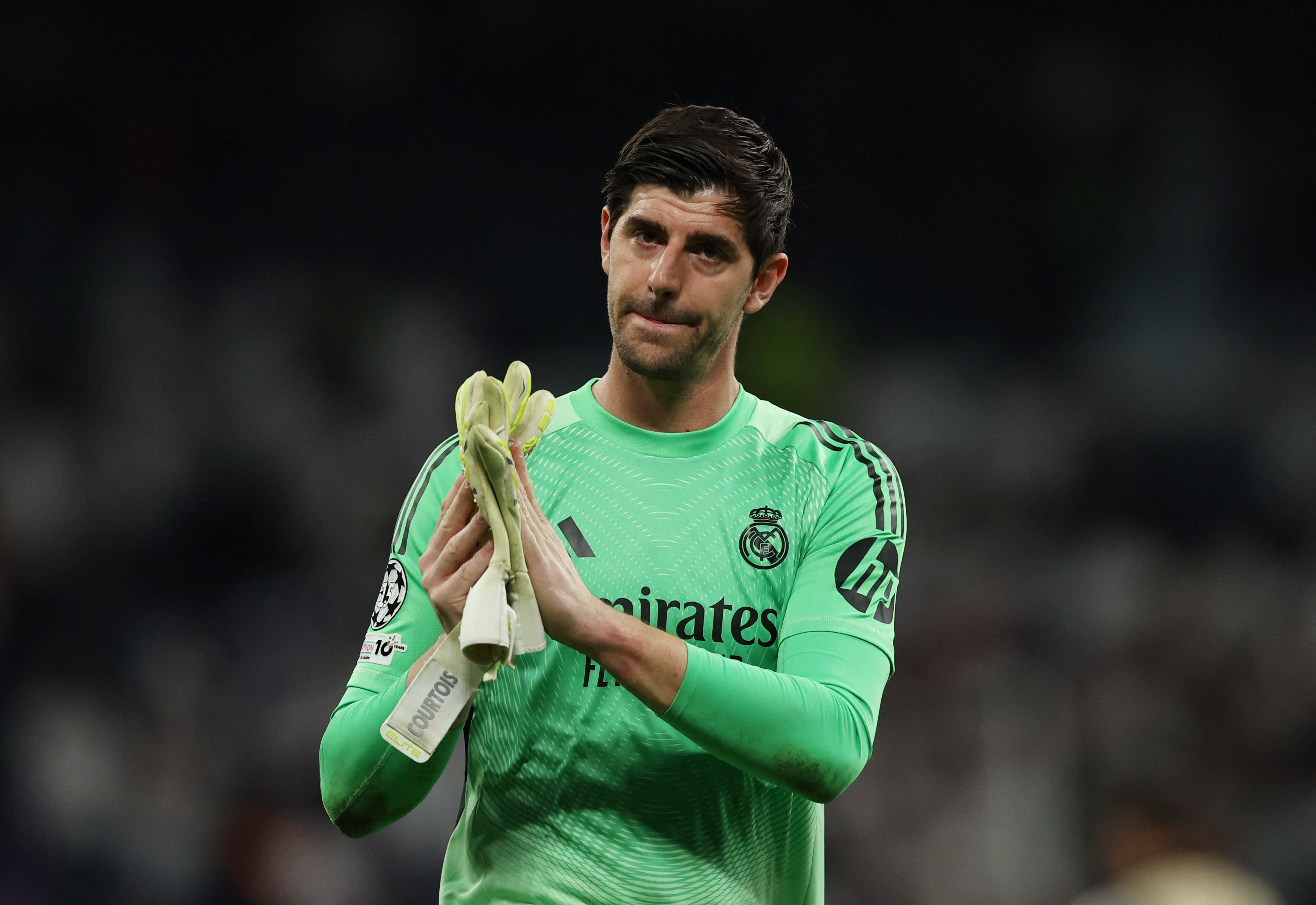 Soccer Football - UEFA Champions League - Play Off - Second Leg - Real Madrid v Benfica - Santiago Bernabeu, Madrid, Spain - February 25, 2026 Real Madrid's Thibaut Courtois celebrates after the match REUTERS/Violeta Santos Moura