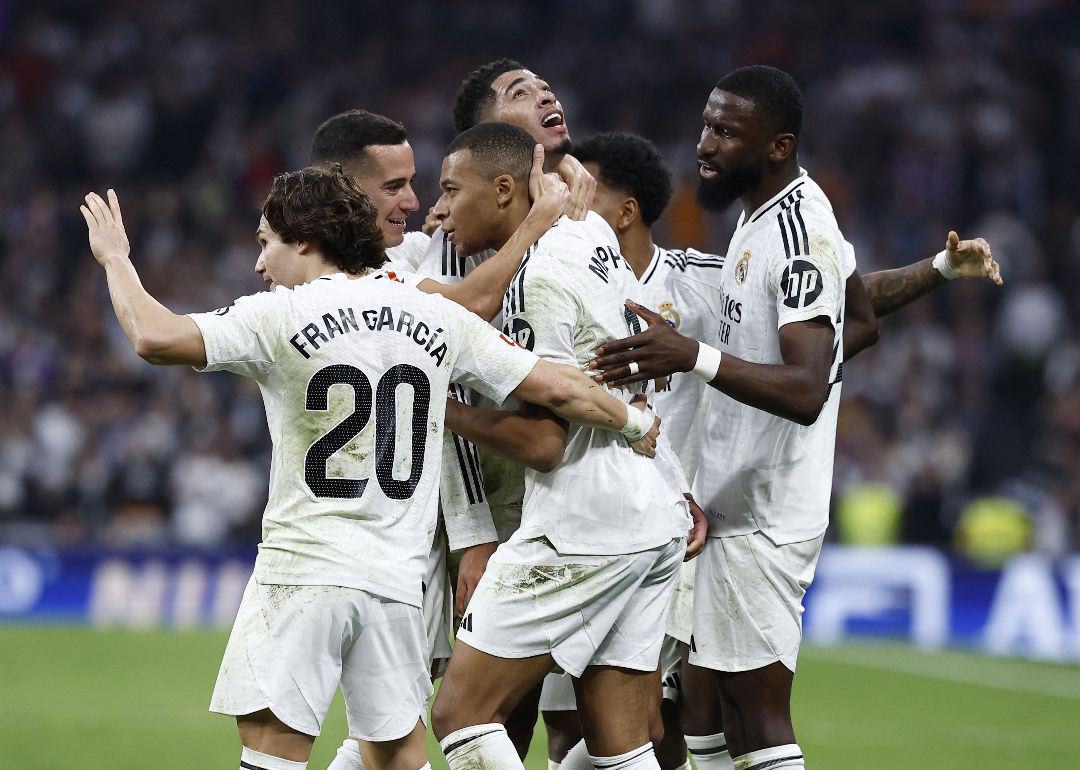 Soccer Football - LaLiga - Real Madrid v Getafe - Santiago Bernabeu, Madrid, Spain - December 1, 2024 Real Madrid's Kylian Mbappe celebrates scoring their second goal with teammates REUTERS/Juan Medina