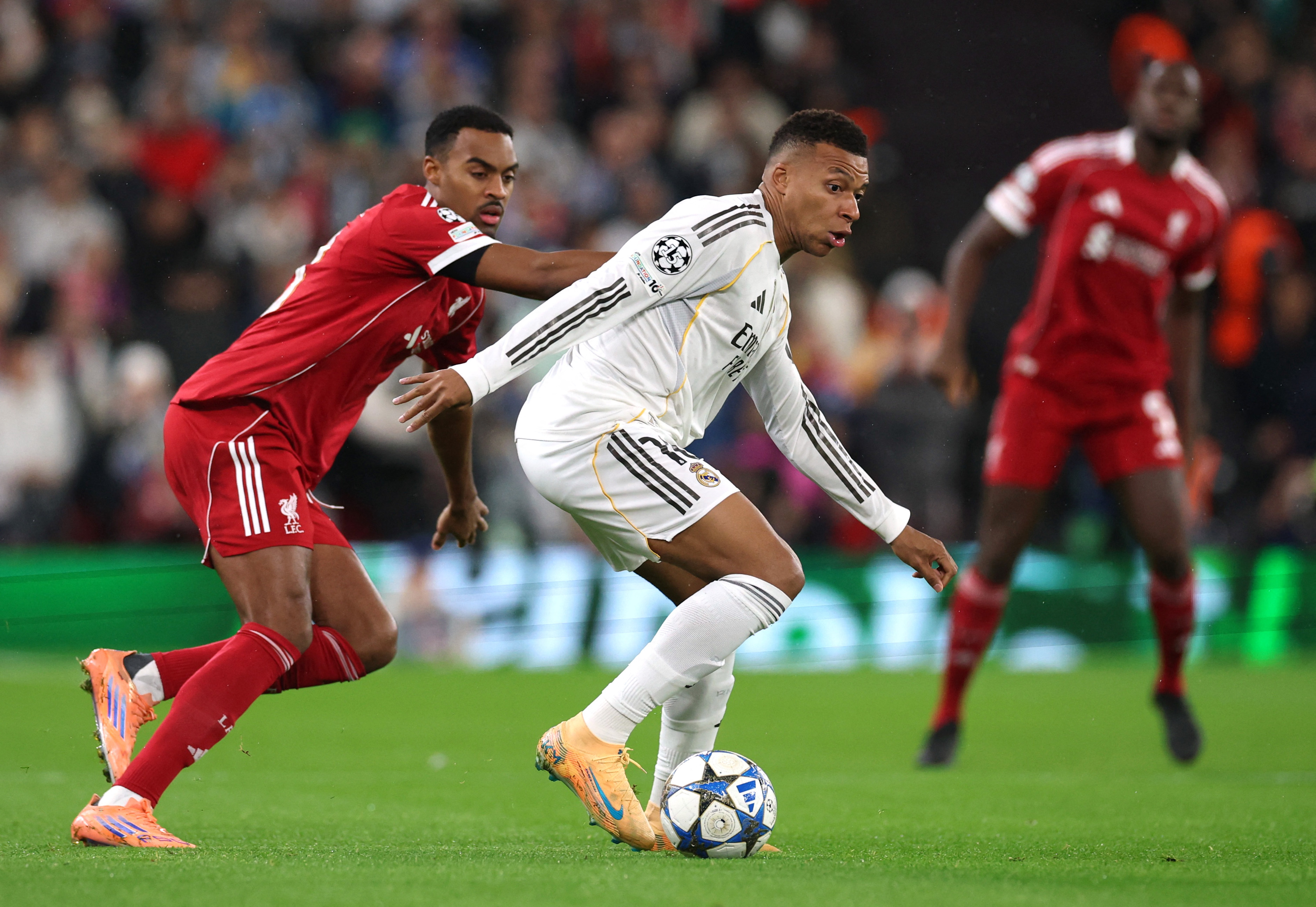 Real Madrid's Kylian Mbappe up against Liverpool's Ryan Gravenberch.