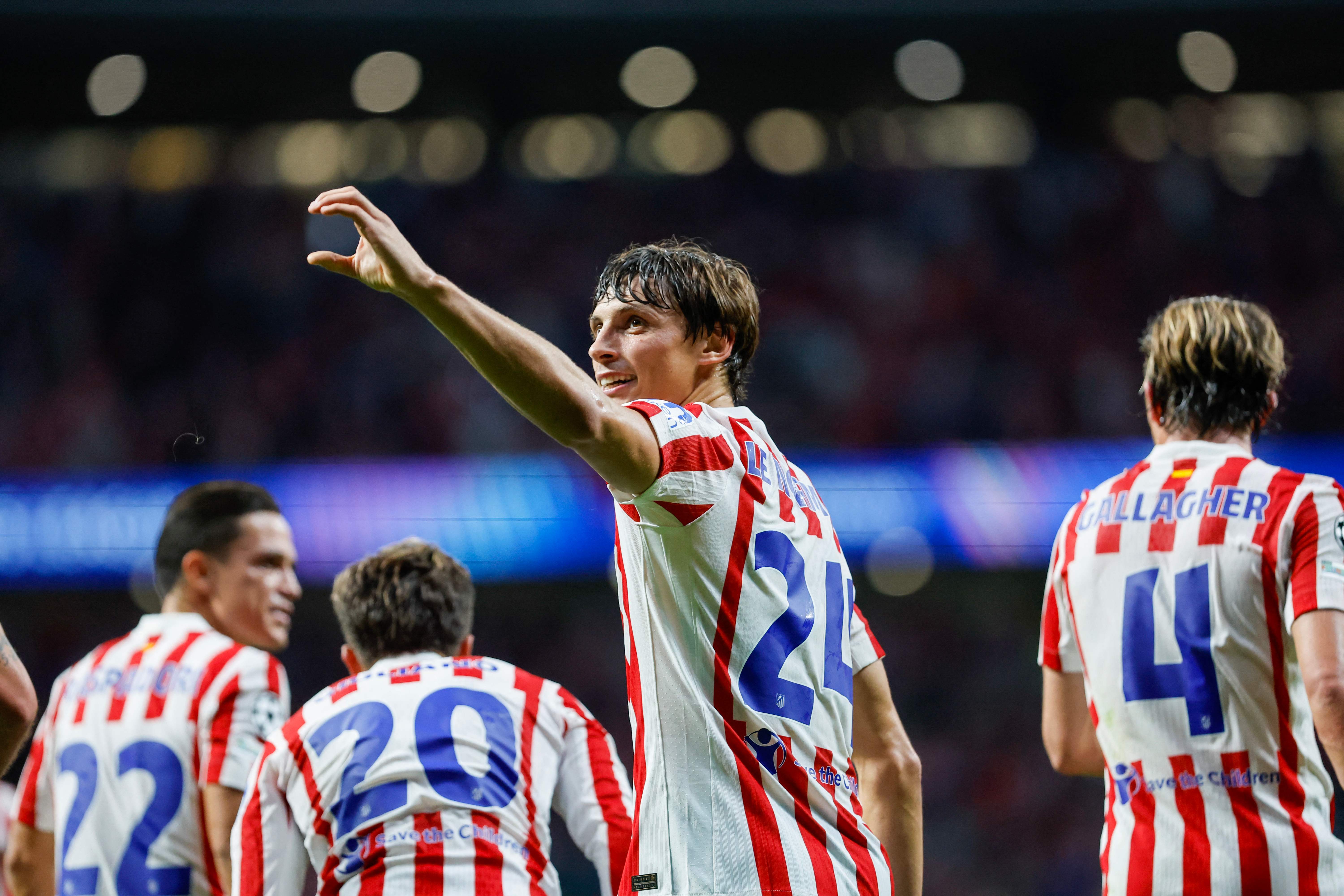 Atletico Madrid's Spanish defender #24 Robin Le Normand celebrates scoring their second goal during the UEFA Champions League, league Phase - matchday 2 football match between Club Atletico de Madrid and Eintracht Frankfurt at the Metropolitano stadium in Madrid on September 30, 2025. (Photo by Oscar DEL POZO / AFP)