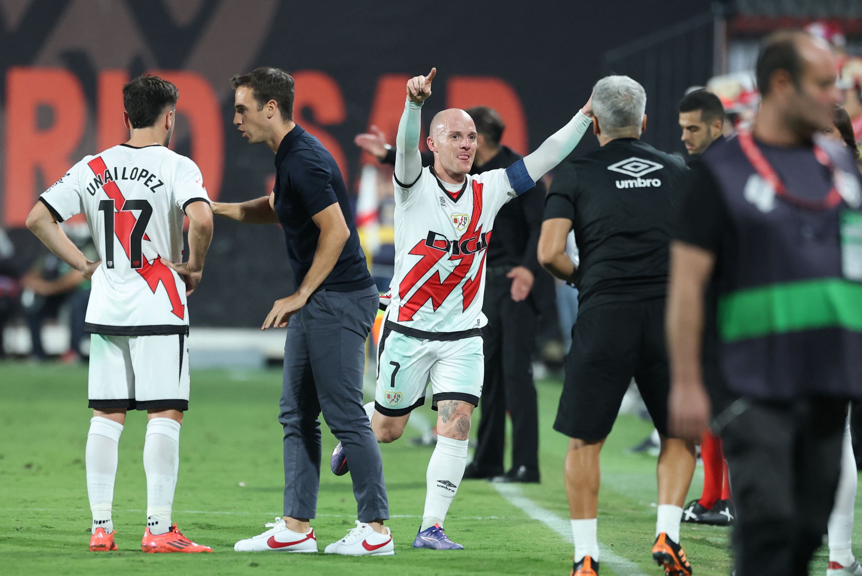 Rayo Vallecano's Spanish forward #07 Isi Palazon celebrates after scoring his team's first goal during the Spanish league football match between Rayo Vallecano de Madrid and Club Atletico de Madrid at the Vallecas stadium in Madrid on September 22, 2024. (Photo by Thomas COEX / AFP)