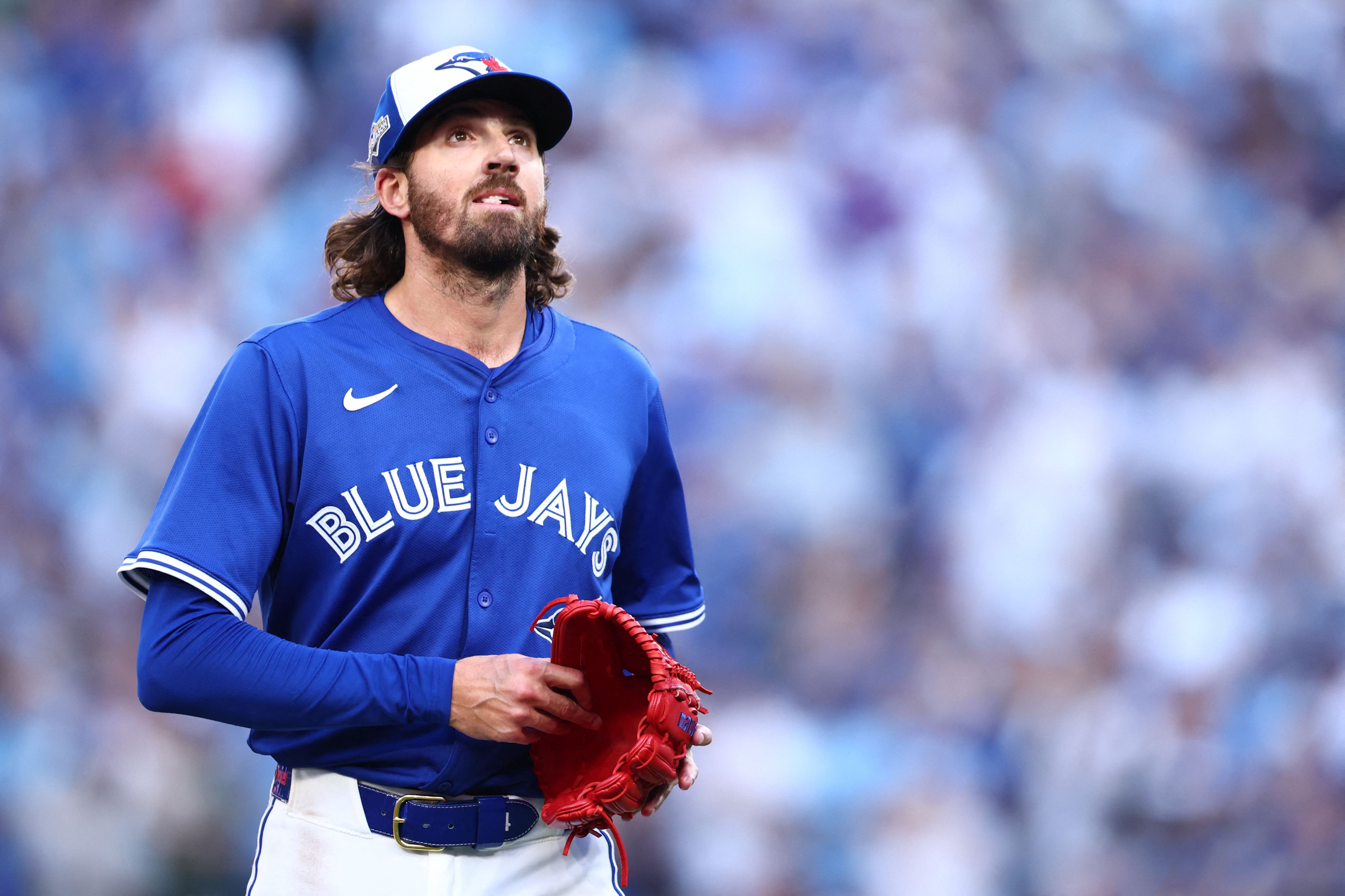 TORONTO, ONTARIO - OCTOBER 04: Kevin Gausman #34 of the Toronto Blue Jays reacts after being removed from the sixth inning of game one of the Division Series against the New York Yankees at Rogers Centre on October 04, 2025 in Toronto, Ontario.   Vaughn Ridley/Getty Images/AFP (Photo by Vaughn Ridley / GETTY IMAGES NORTH AMERICA / Getty Images via AFP)