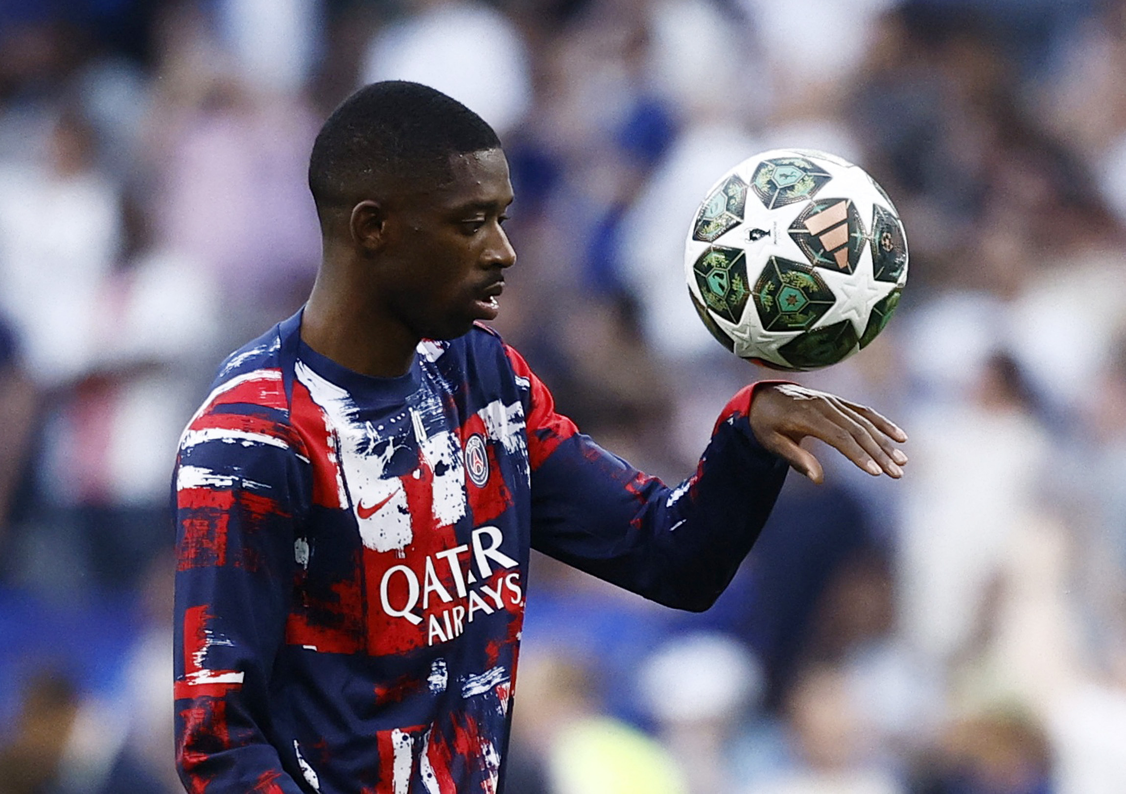 Soccer Football - Champions League - Final - Paris St Germain v Inter Milan - Allianz Arena, Munich, Germany - May 31, 2025 Paris St Germain's Ousmane Dembele during the warm up before the match REUTERS/Stephanie Lecocq