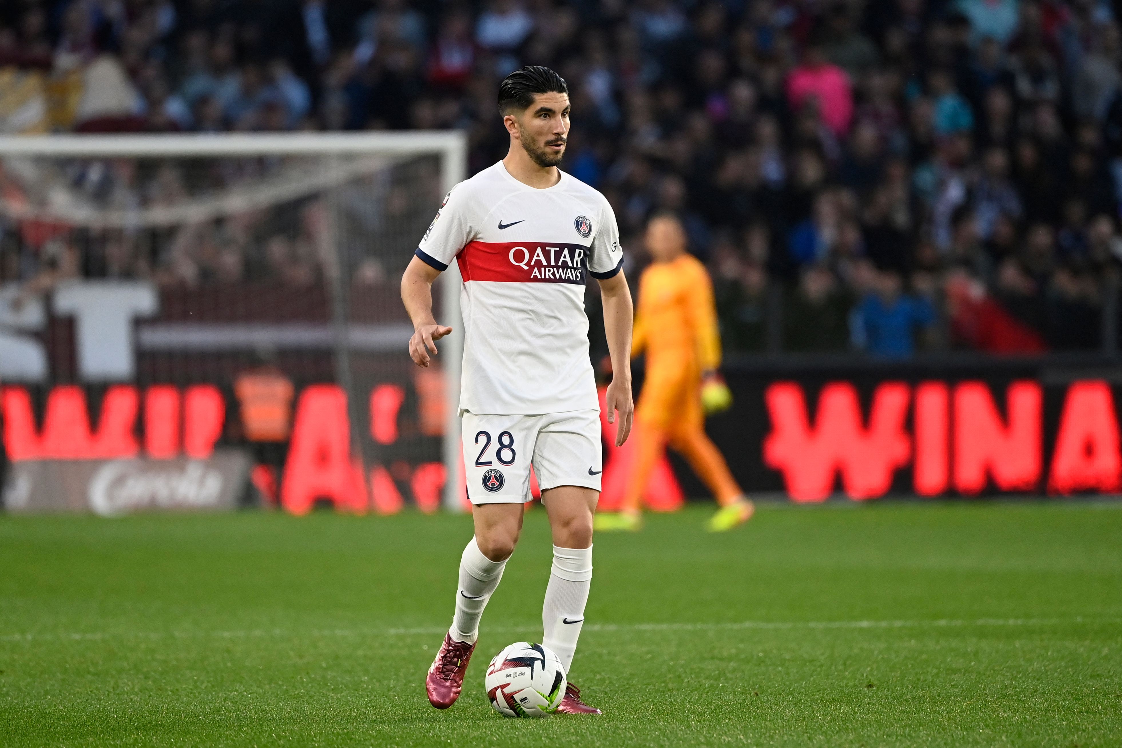 Paris Saint-Germain's Spanish midfielder #28 Carlos Soler controls the ball during the French L1 football match between FC Metz and Paris Saint-Germain (PSG) at the Saint-Symphorien Stadium in Longeville-les-Metz, eastern France, on May 19, 2024. (Photo by Jean-Christophe VERHAEGEN / AFP)