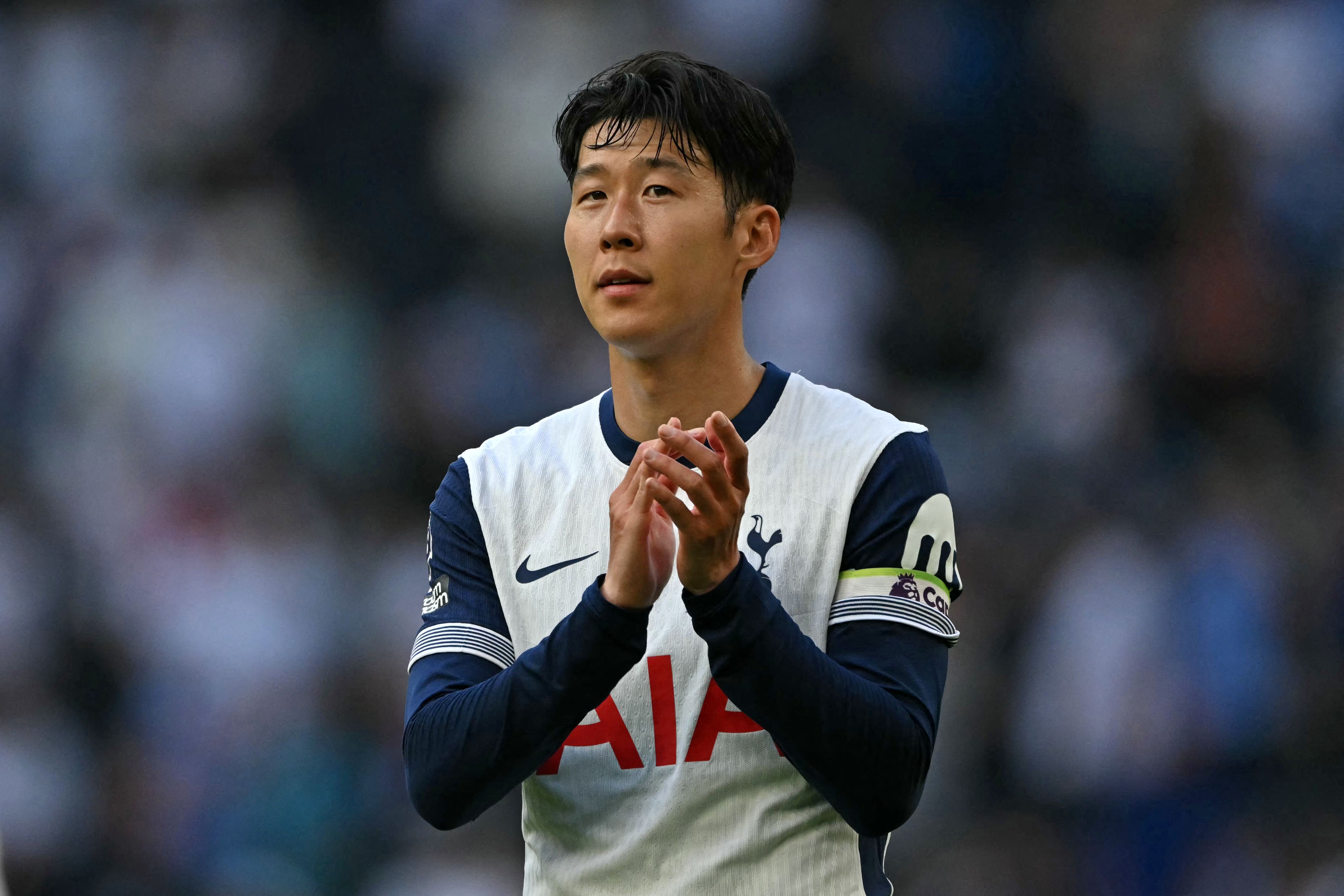 Tottenham Hotspur's South Korean striker #07 Son Heung-Min applauds fans after the English Premier League football match between Tottenham Hotspur and Brentford at the Tottenham Hotspur Stadium in London, on September 21, 2024. Tottenham won the game 3-1. (Photo by Glyn KIRK / AFP) / RESTRICTED TO EDITORIAL USE. No use with unauthorized audio, video, data, fixture lists, club/league logos or 'live' services. Online in-match use limited to 120 images. An additional 40 images may be used in extra time. No video emulation. Social media in-match use limited to 120 images. An additional 40 images may be used in extra time. No use in betting publications, games or single club/league/player publications. / 