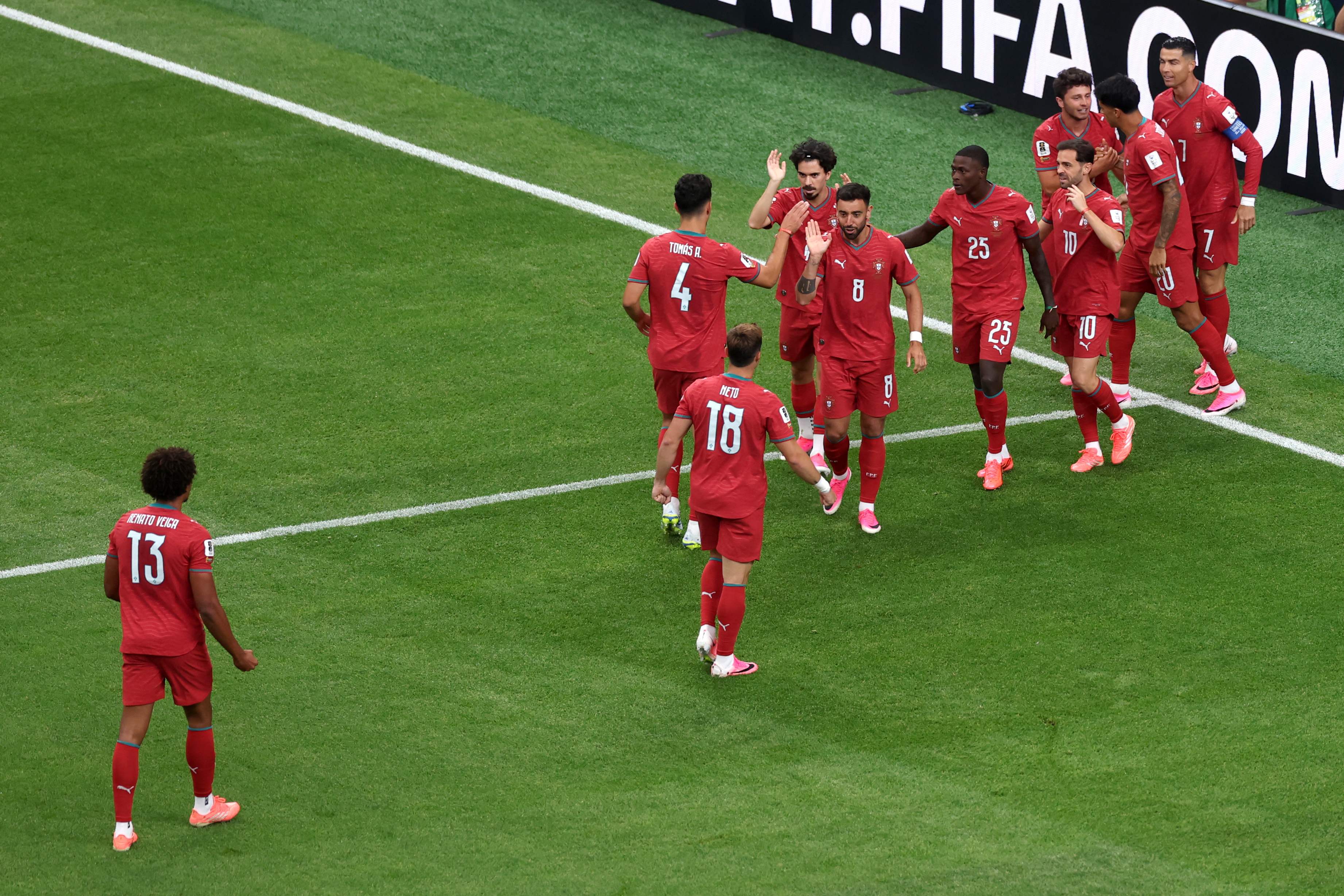 HOUSTON, TEXAS - JUNE 17: Joao Neves #15 of Portugal celebrates with teammates after scoring the team's first goal during the FIFA World Cup 2026 Group K match between Portugal and Congo DR at Houston Stadium on June 17, 2026 in Houston, Texas. Lars Baron/Getty Images/AFP (Photo by Lars Baron / GETTY IMAGES NORTH AMERICA / Getty Images via AFP)