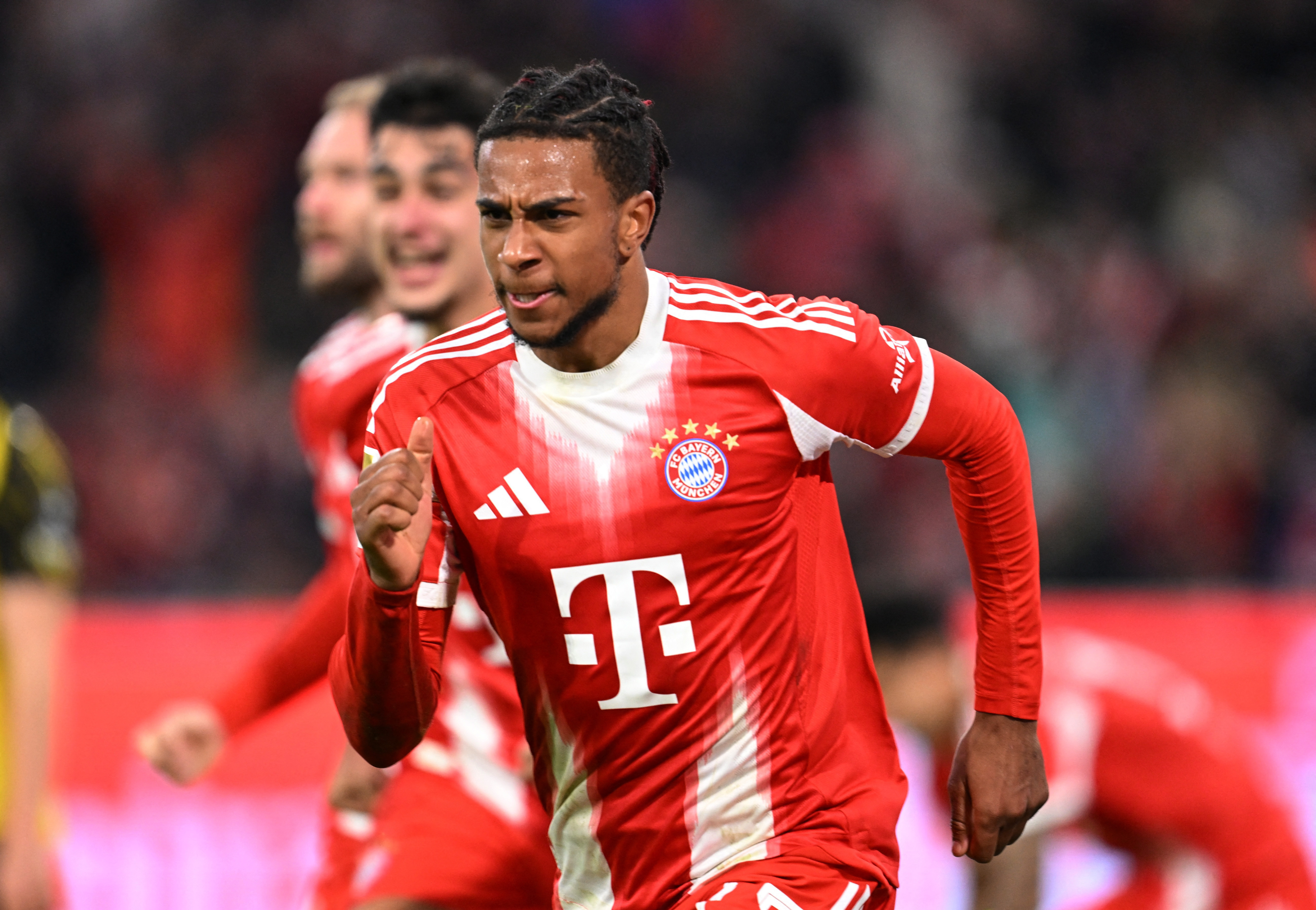 Soccer Football - Bundesliga - Bayern Munich v Borussia Dortmund - Allianz Arena, Munich, Germany - October 18, 2025 Bayern Munich's Michael Olise celebrates scoring their second goal REUTERS/Angelika Warmuth DFL REGULATIONS PROHIBIT ANY USE OF PHOTOGRAPHS AS IMAGE SEQUENCES AND/OR QUASI-VIDEO.