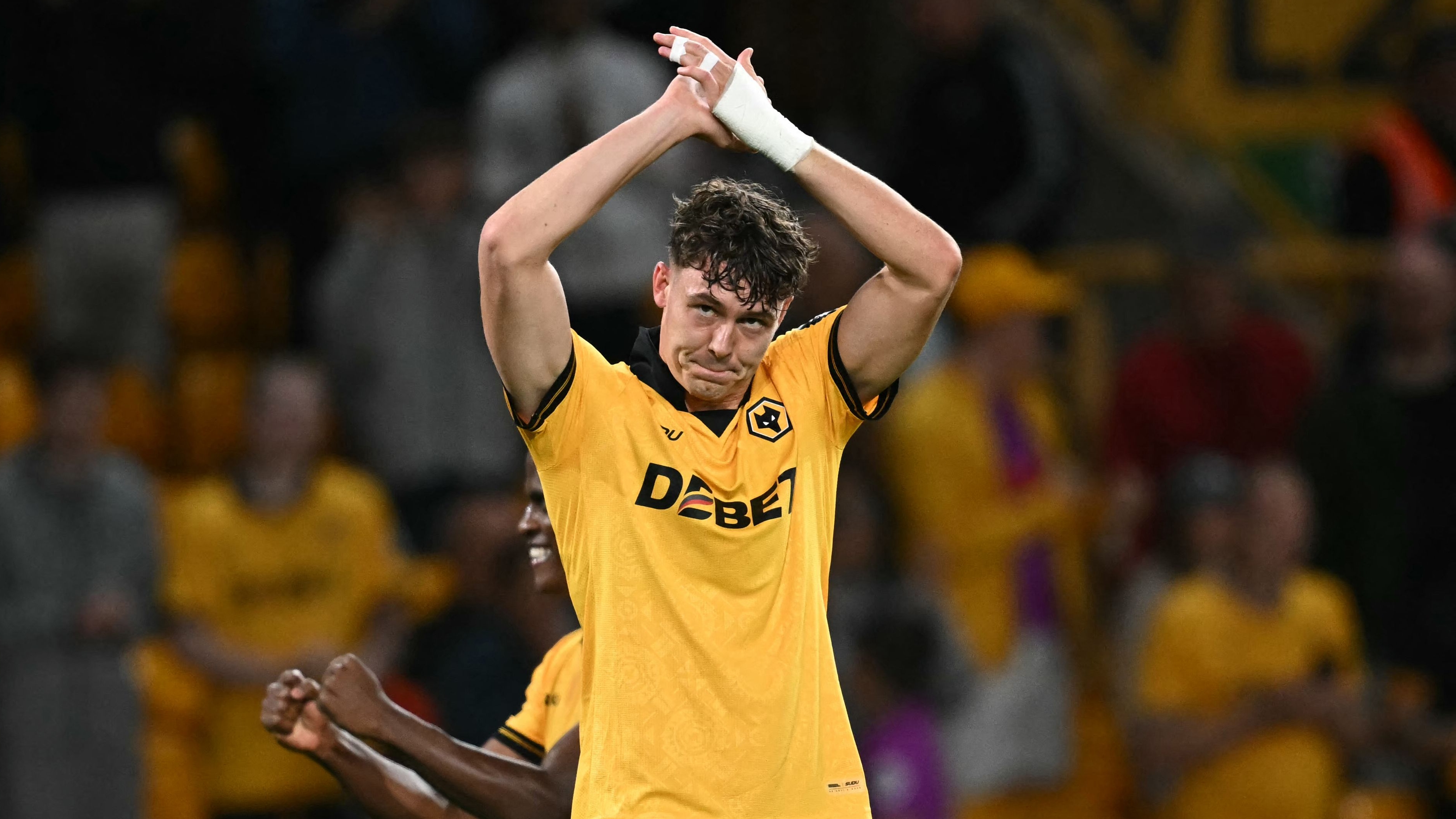 Wolverhampton Wanderers' Norwegian striker #09 Jorgen Strand Larsen celebrates after scoring their third goal during the English League cup second round football match between Wolverhampton Wanderers and West Ham United at the Molineux stadium in Wolverhampton, central England on August 26, 2025. (Photo by Paul ELLIS / AFP) / RESTRICTED TO EDITORIAL USE. No use with unauthorized audio, video, data, fixture lists, club/league logos or 'live' services. Online in-match use limited to 120 images. An additional 40 images may be used in extra time. No video emulation. Social media in-match use limited to 120 images. An additional 40 images may be used in extra time. No use in betting publications, games or single club/league/player publications. / 