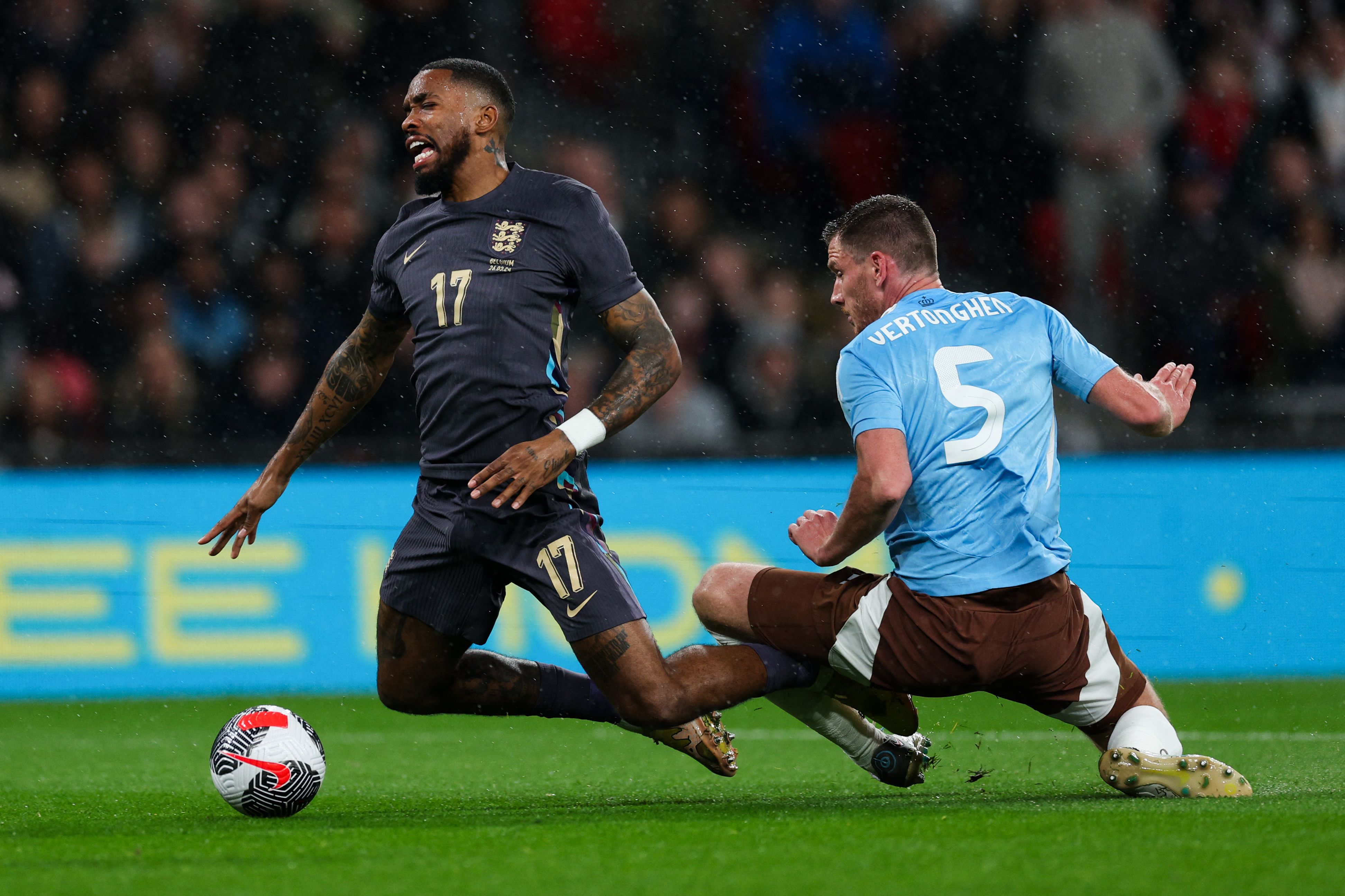 England's striker #17 Ivan Toney is brought down in the penalty box by Belgium's defender #05 Jan Vertonghen during the International friendly football match between England and Belgium at Wembley stadium, in London, on March 26, 2024. (Photo by Adrian DENNIS / AFP) / NOT FOR MARKETING OR ADVERTISING USE / RESTRICTED TO EDITORIAL USE