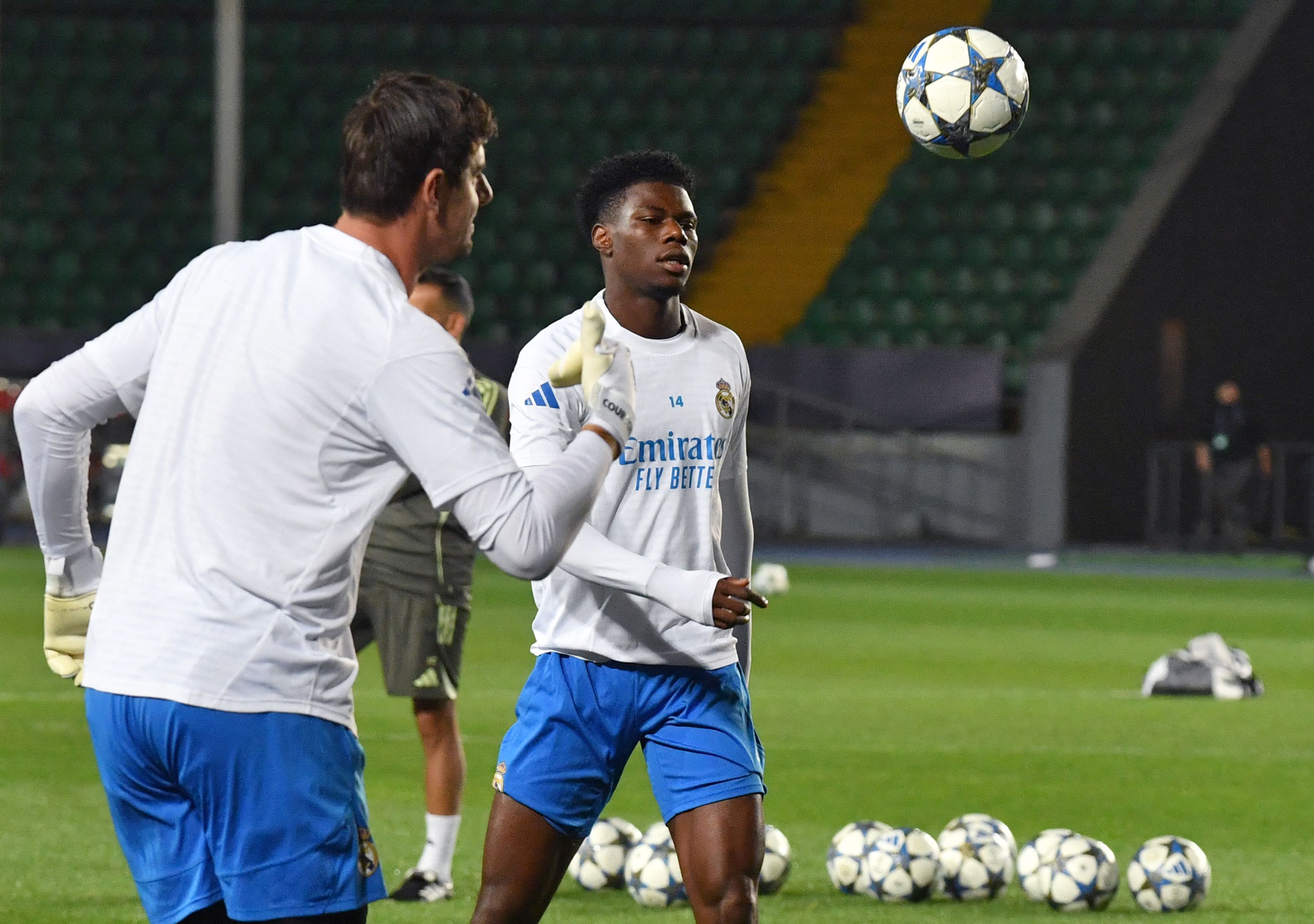 Real Madrid's French midfielder #14 Aurelien Tchouameni (C) takes part in a training session on the eve of the team's UEFA Champions League first round day 2 football match between Real Madrid (ESP) and Kairat Almaty (KAZ), at Almaty Ortalyk stadion in Almaty on September 29, 2025. (Photo by VYACHESLAV OSELEDKO / AFP)