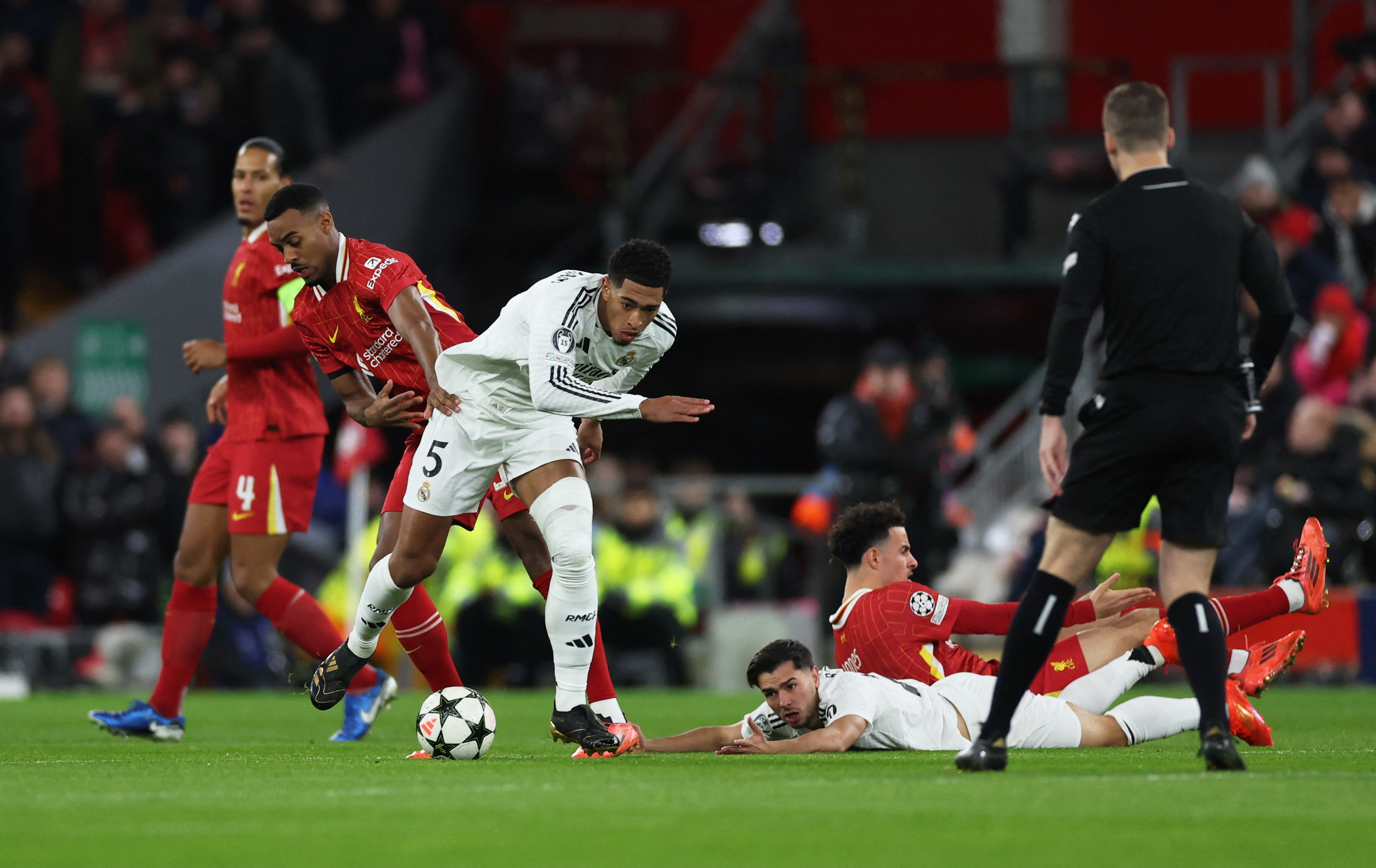 Soccer Football - Champions League - Liverpool v Real Madrid - Anfield, Liverpool, Britain - November 27, 2024  Liverpool's Ryan Gravenberch in action with Real Madrid's Jude Bellingham Action Images via Reuters/Lee Smith