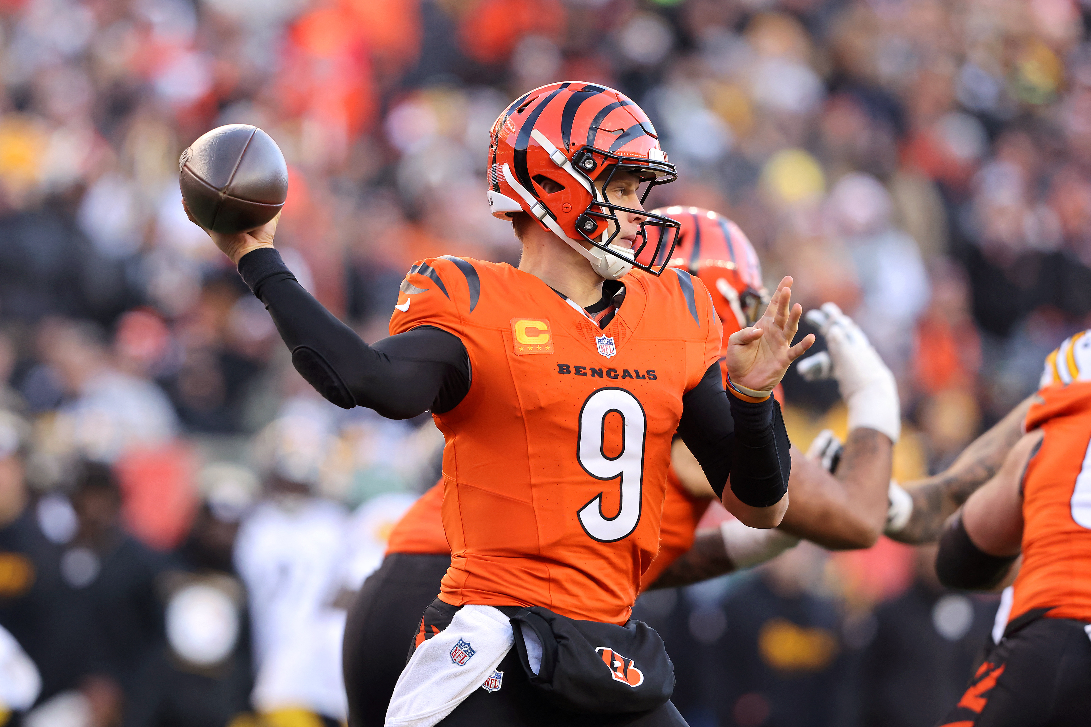 Dec 1, 2024; Cincinnati, Ohio, USA; Cincinnati Bengals quarterback Joe Burrow (9) drops to throw during the fourth quarter against the Pittsburgh Steelers at Paycor Stadium. Mandatory Credit: Joseph Maiorana-Imagn Images